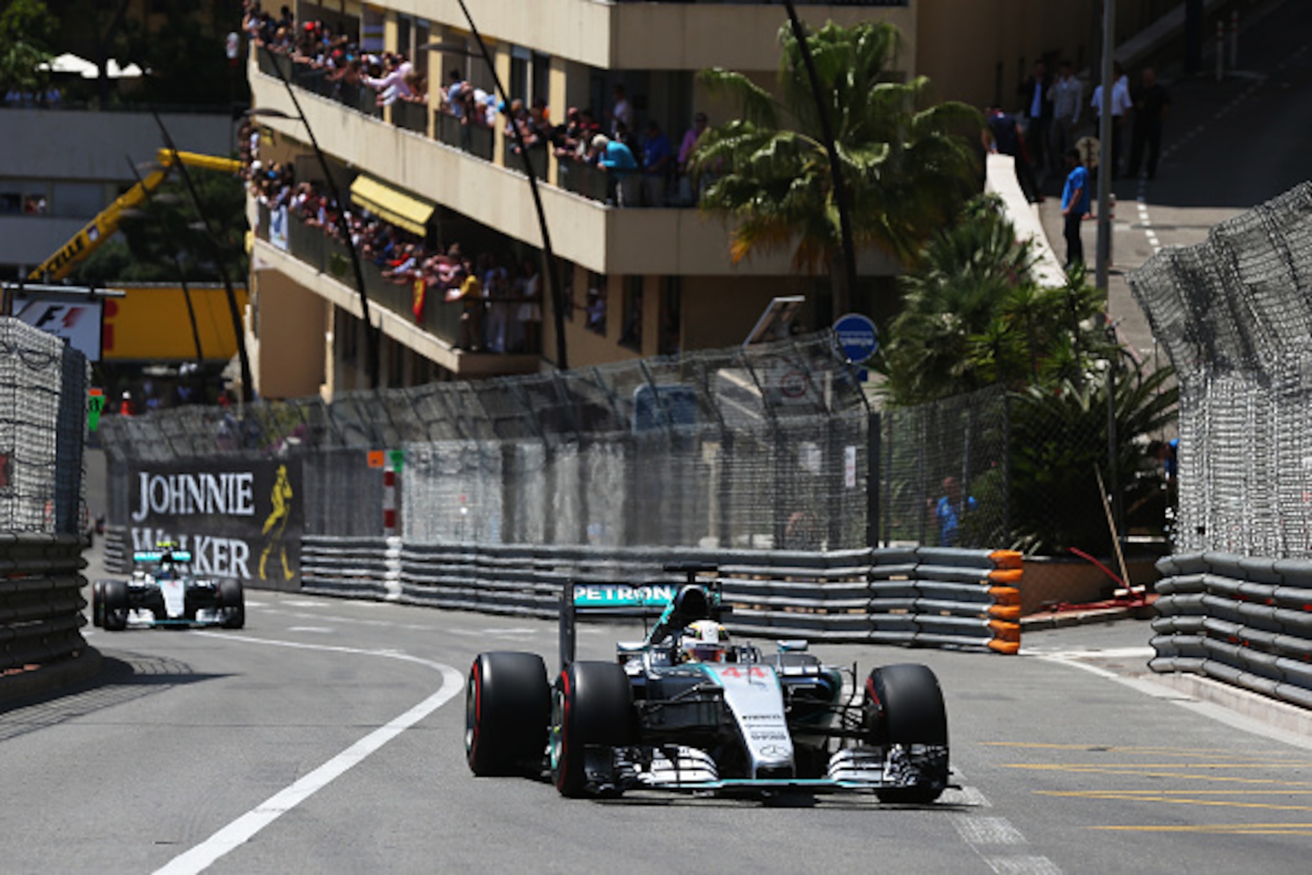 MONTE-CARLO, MONACO - MAY 24:  Lewis Hamilton of Great Britain and Mercedes GP leads from team mate Nico Rosberg of Germany and Mercedes GP during the Monaco Formula One Grand Prix at Circuit de Monaco on May 24, 2015 in Monte-Carlo, Monaco.  (Photo by Ke