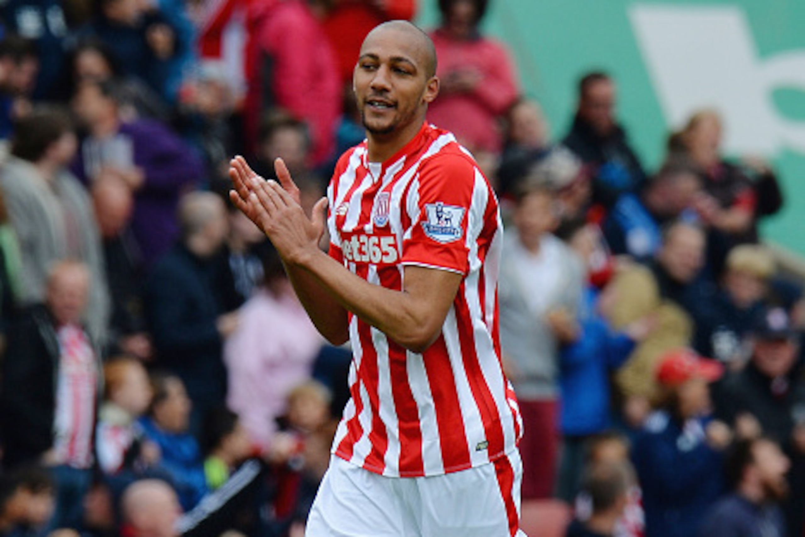 STOKE ON TRENT, ENGLAND - MAY 24: Steven Nzonzi of Stoke City celebrates scoring their fifth goal during the Barclays Premier League match between Stoke City and Liverpool at Britannia Stadium on May 24, 2015 in Stoke on Trent, England.  (Photo by Tony Ma