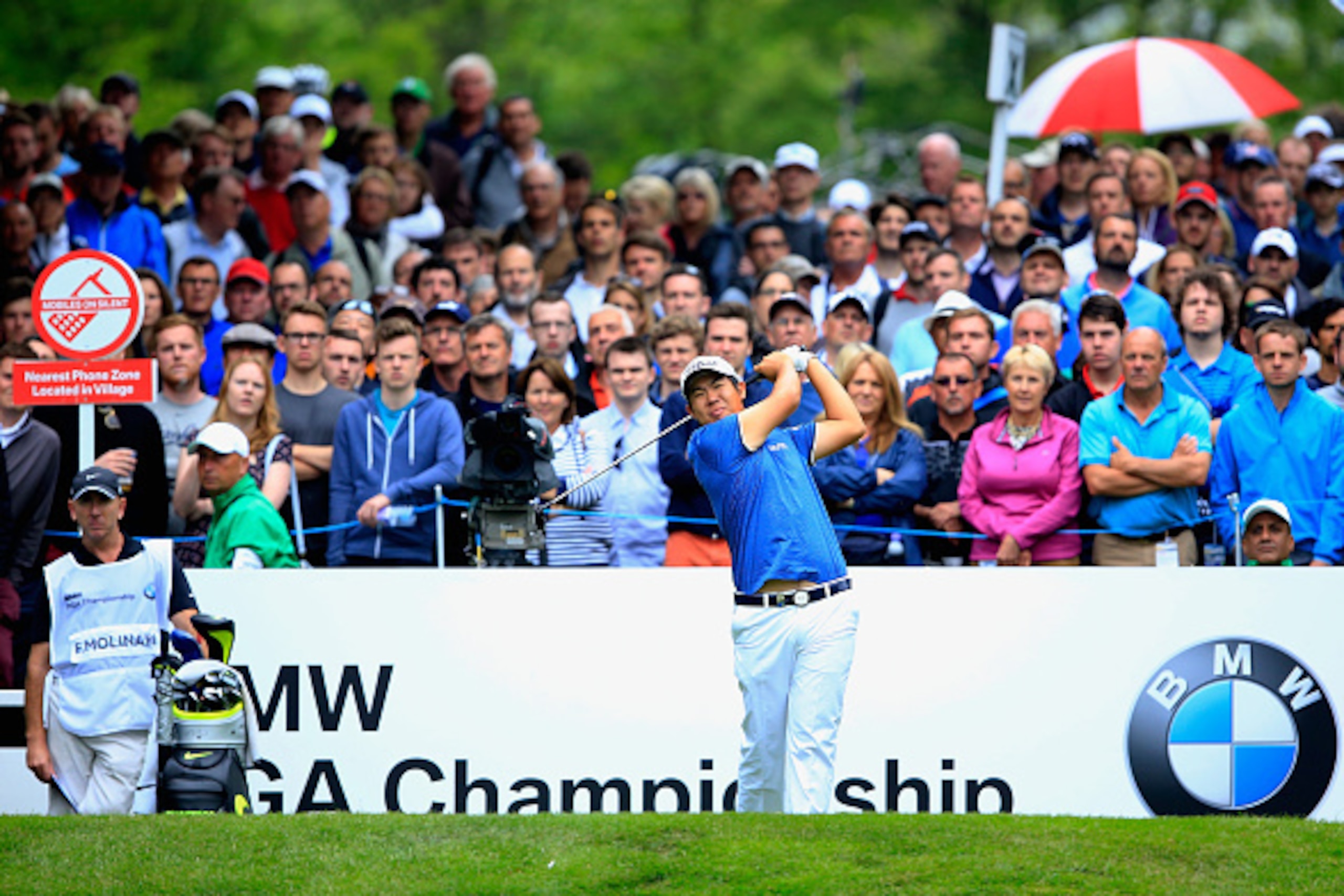 VIRGINIA WATER, ENGLAND - MAY 24:  Byeong-Hun An of South Korea tees off on the 17th hole during day 4 of the BMW PGA Championship at Wentworth on May 24, 2015 in Virginia Water, England.  (Photo by David Cannon/Getty Images)