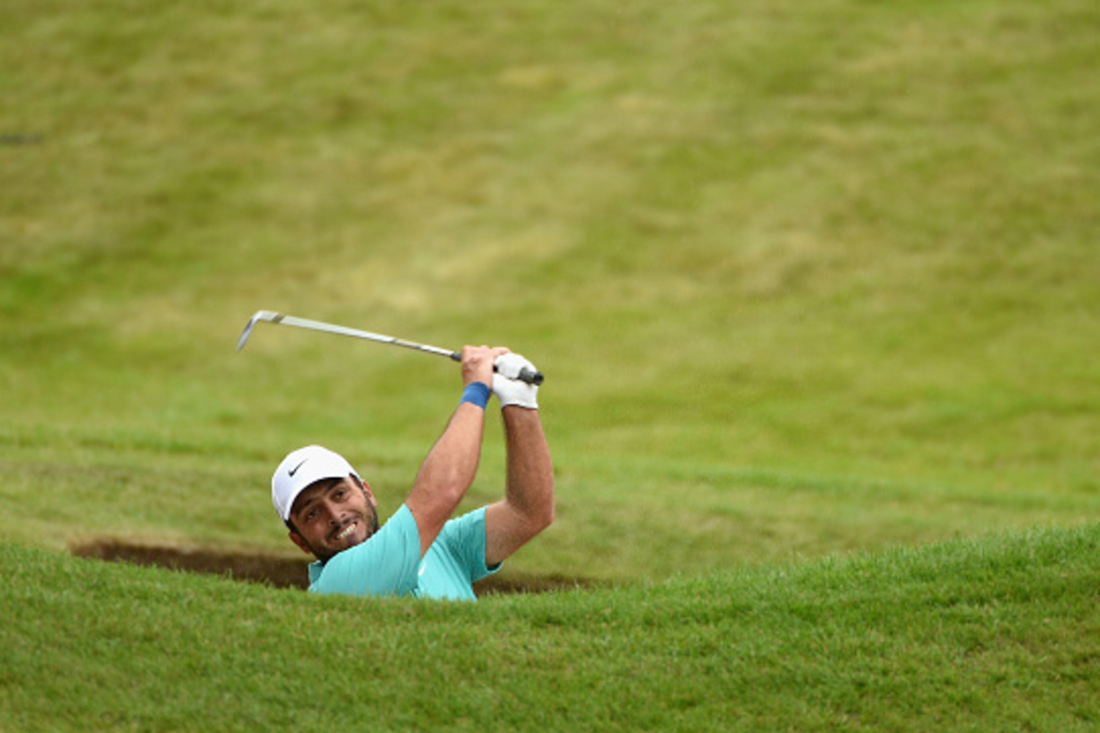 VIRGINIA WATER, ENGLAND - MAY 24:  Francesco Molinari of Itay hits from a bunker on the 11th hole during day 4 of the BMW PGA Championship at Wentworth on May 24, 2015 in Virginia Water, England.  (Photo by Ross Kinnaird/Getty Images)