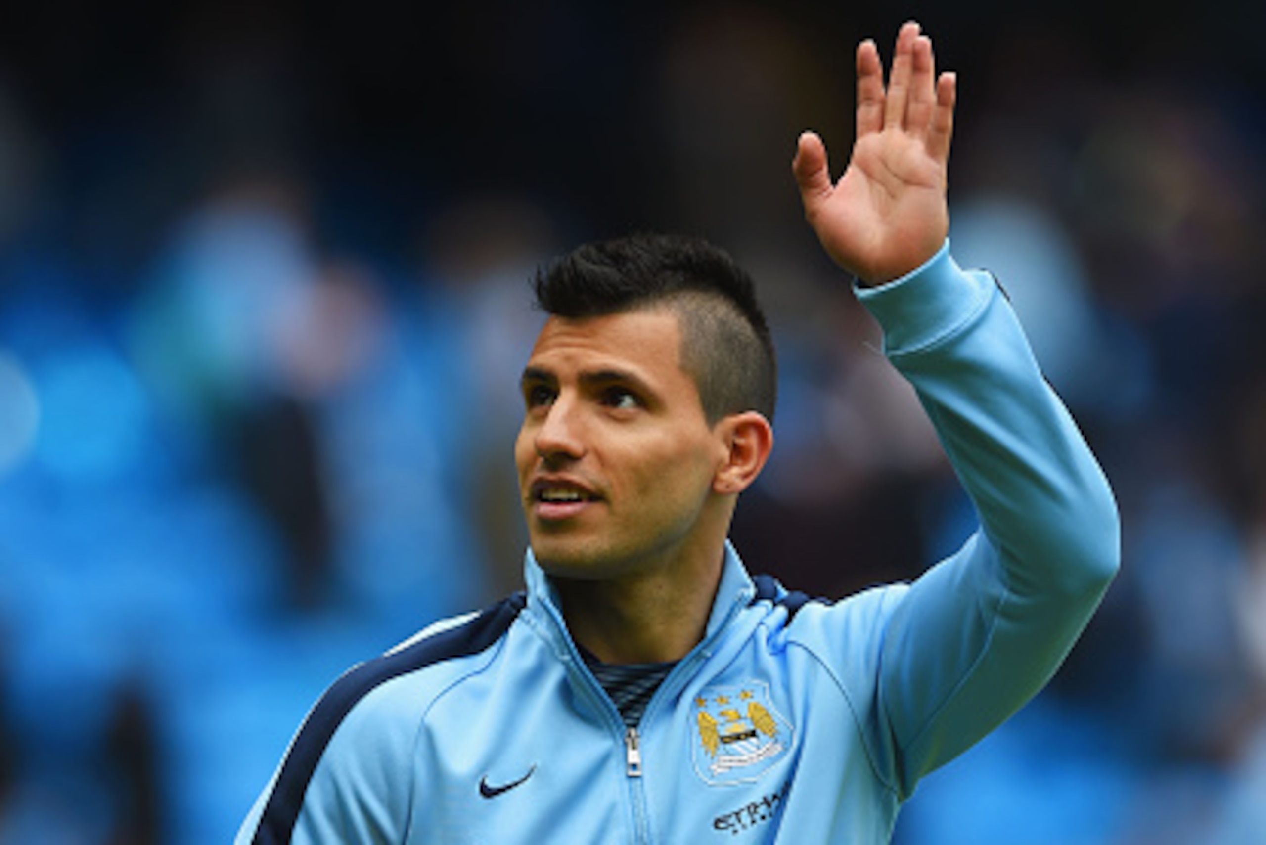 MANCHESTER, ENGLAND - MAY 24: Sergio Aguero of Manchester City holding the golden boots trophy waves to supporters after the Barclays Premier League match between Manchester City and Southampton at Etihad Stadium on May 24, 2015 in Manchester, England. MANCHESTER, ENGLAND - MAY 24: Sergio Aguero of Manchester City holding the golden boots trophy waves to supporters after the Barclays Premier League match between Manchester City and Southampton at Etihad Stadium on May 24, 2015 in Manchester, England.