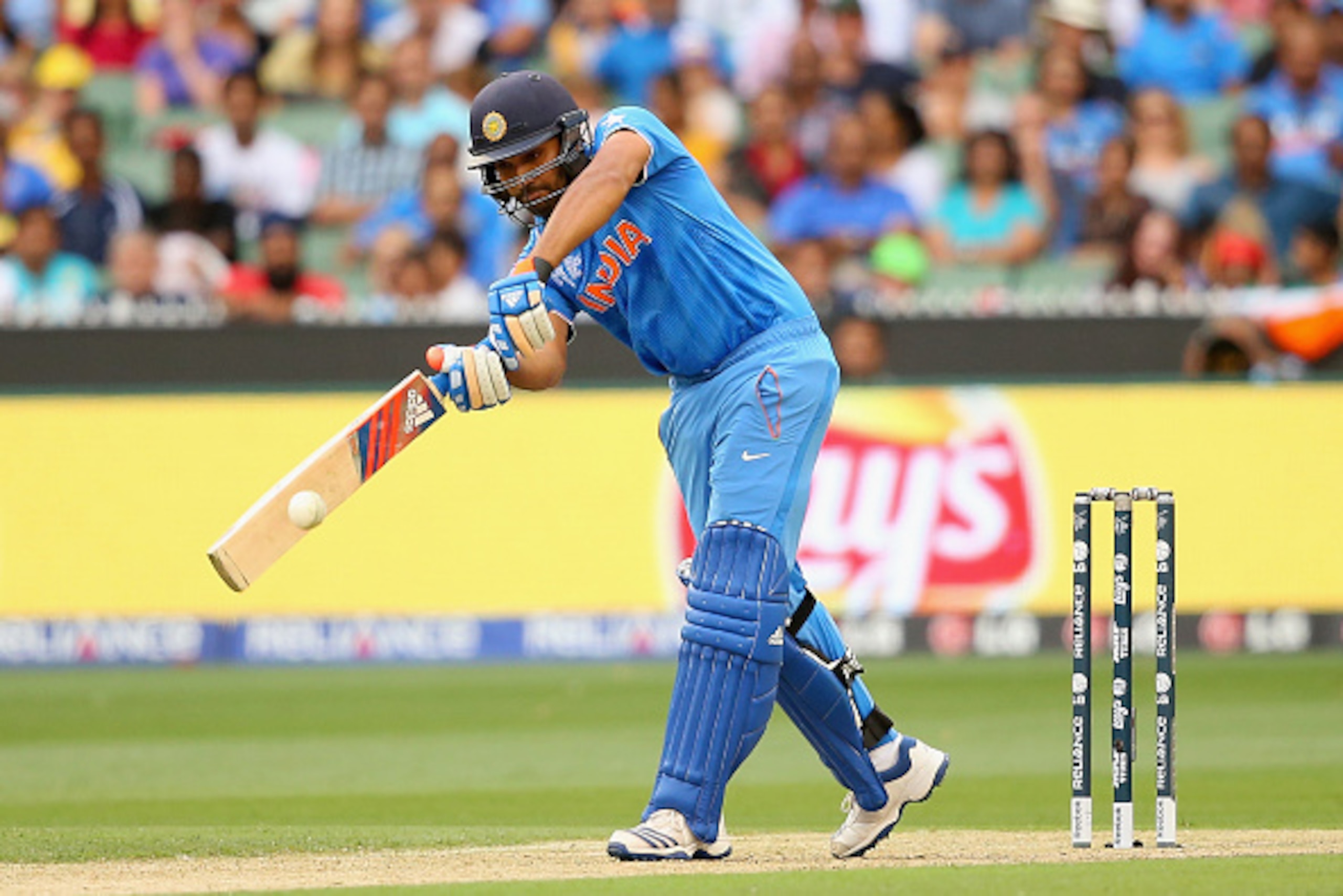 MELBOURNE, AUSTRALIA - MARCH 19:  Rohit Sharma of India bats during the 2015 ICC Cricket World Cup Quater Final match between India and Bangldesh at Melbourne Cricket Ground on March 19, 2015 in Melbourne, Australia.  (Photo by Quinn Rooney/Getty Images)