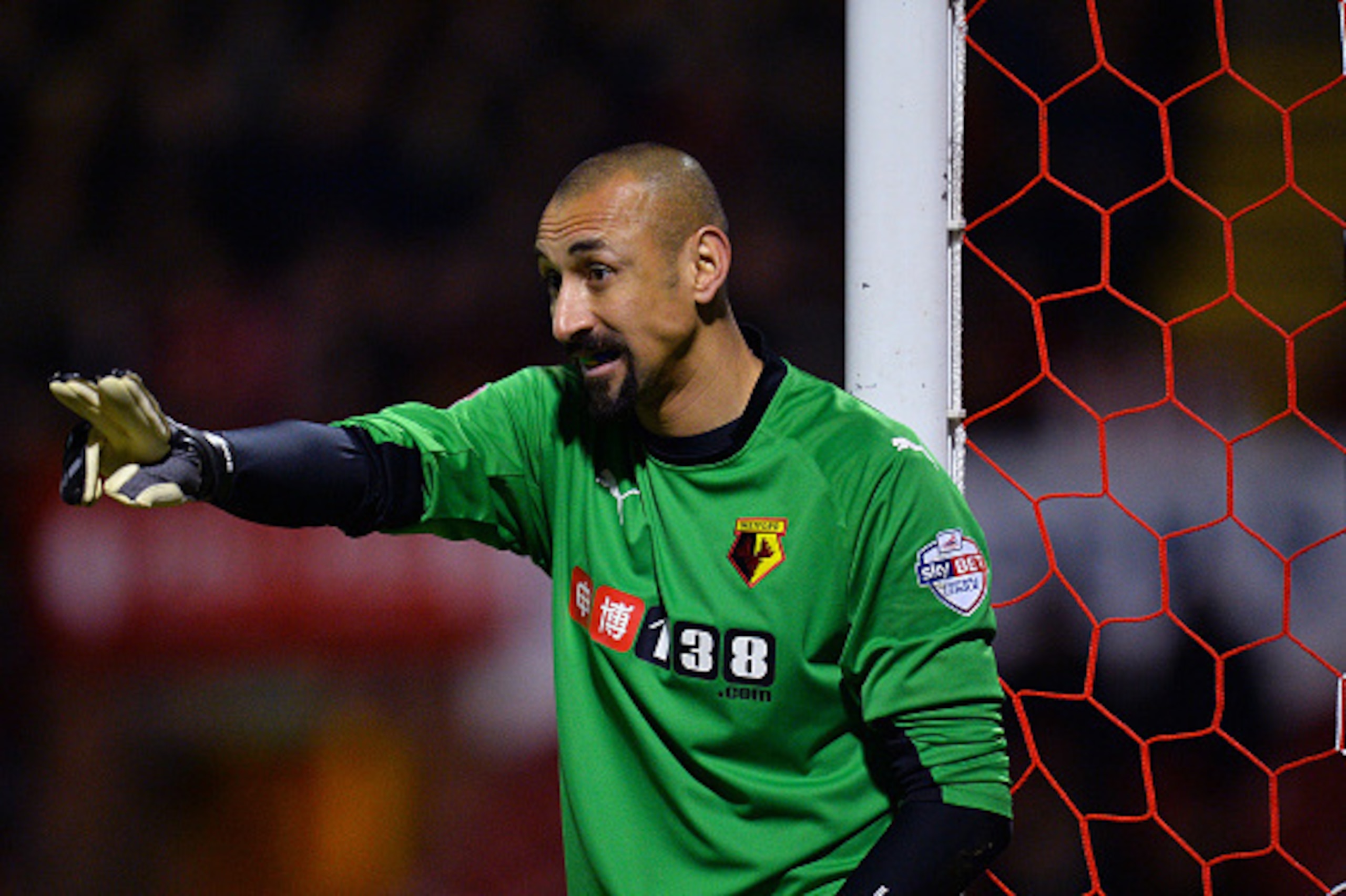 BRENTFORD, ENGLAND - FEBRUARY 10: Heurelho Gomes of Watford makes a point during the Sky Bet Championship match between Brentford and Watford at Griffin Park on February 10, 2015 in Brentford, England.  (Photo by Justin Setterfield/Getty Images)
