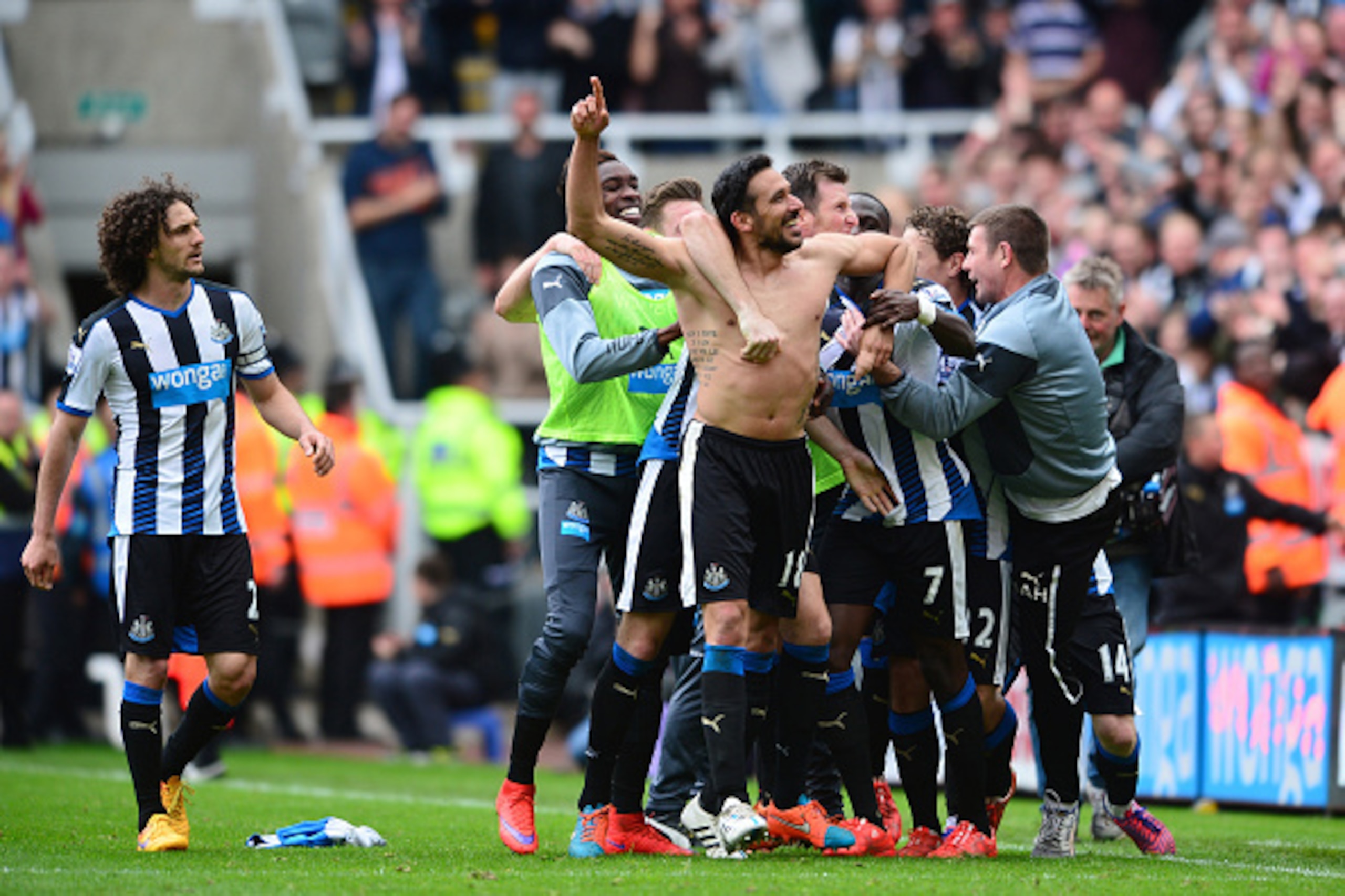 NEWCASTLE UPON TYNE, ENGLAND - MAY 24:  Jonas Gutierrez of Newcastle United celebrates scoring his team's second goal with his team mates during the Barclays Premier League match between Newcastle United and West Ham United at St James' Park on May 24, 20