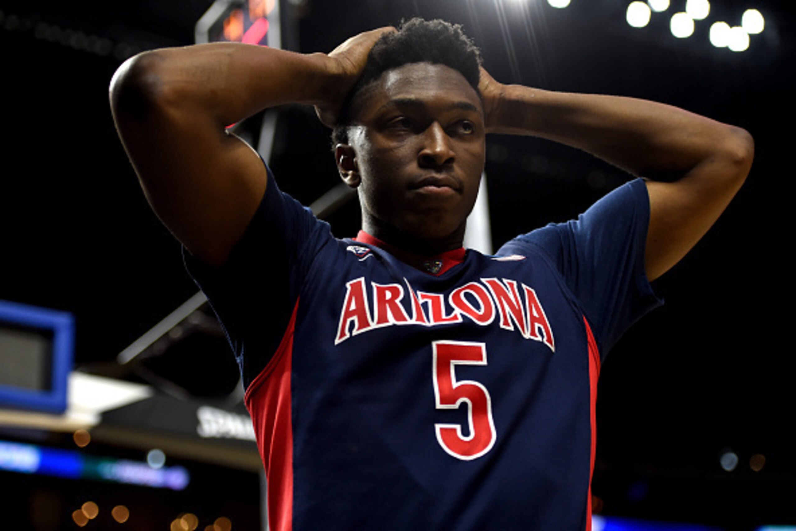 LOS ANGELES, CA - MARCH 28: Stanley Johnson #5 of the Arizona Wildcats reacts after called for a foul in the second half against the Wisconsin Badgers during the West Regional Final of the 2015 NCAA Men's Basketball Tournament at Staples Center on March LOS ANGELES, CA - MARCH 28: Stanley Johnson #5 of the Arizona Wildcats reacts after called for a foul in the second half against the Wisconsin Badgers during the West Regional Final of the 2015 NCAA Men's Basketball Tournament at Staples Center on March