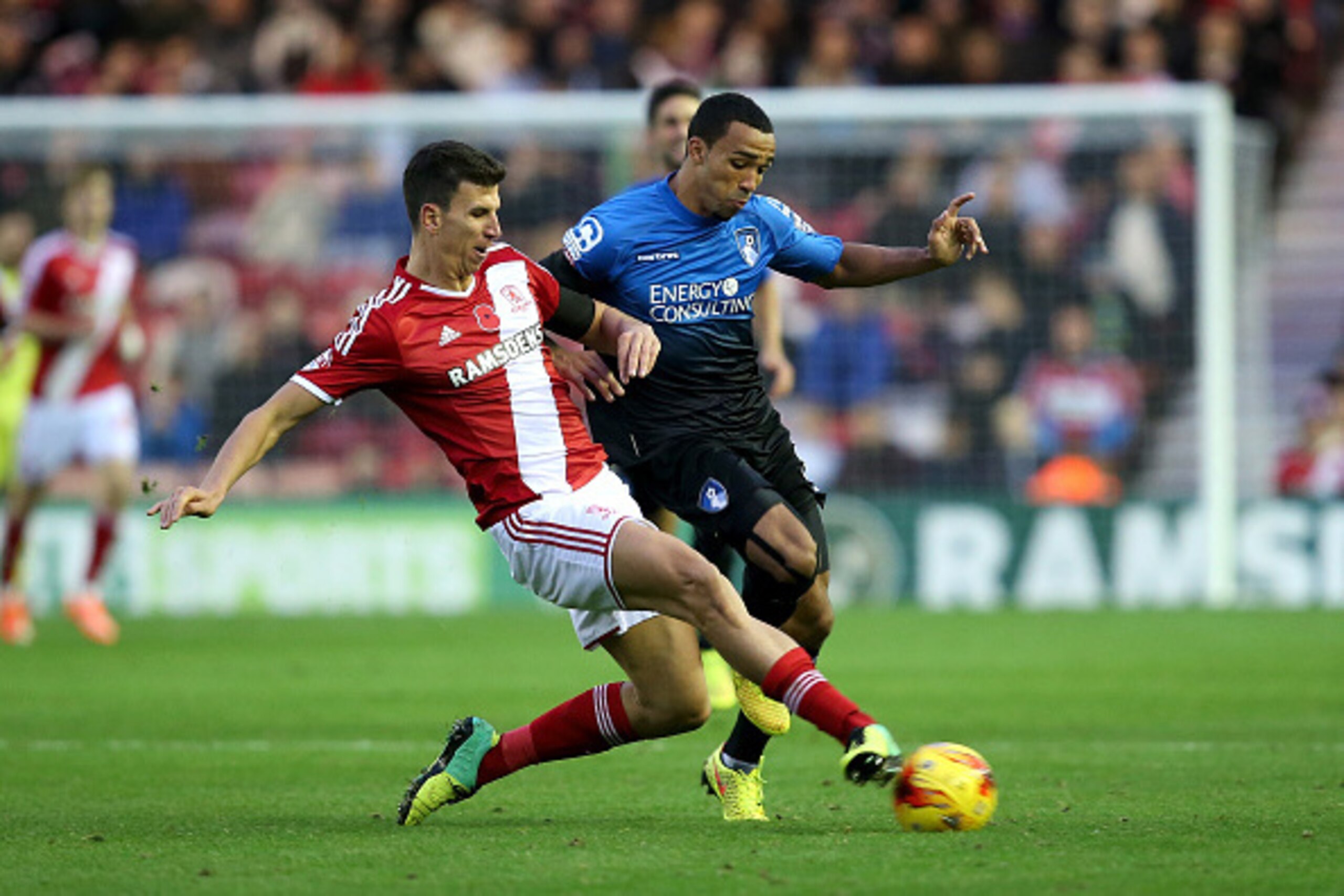 MIDDLESBROUGH, ENGLAND - NOVEMBER 08: Callum Wilson of AFC Bournemouth battles with Daniel Ayala of Middlesbrough during the Sky Bet Championship match between Middlesbrough and Bournemouth at Riverside Stadium on November 8, 2014 in Middlesbrough, Engla MIDDLESBROUGH, ENGLAND - NOVEMBER 08: Callum Wilson of AFC Bournemouth battles with Daniel Ayala of Middlesbrough during the Sky Bet Championship match between Middlesbrough and Bournemouth at Riverside Stadium on November 8, 2014 in Middlesbrough, Engla
