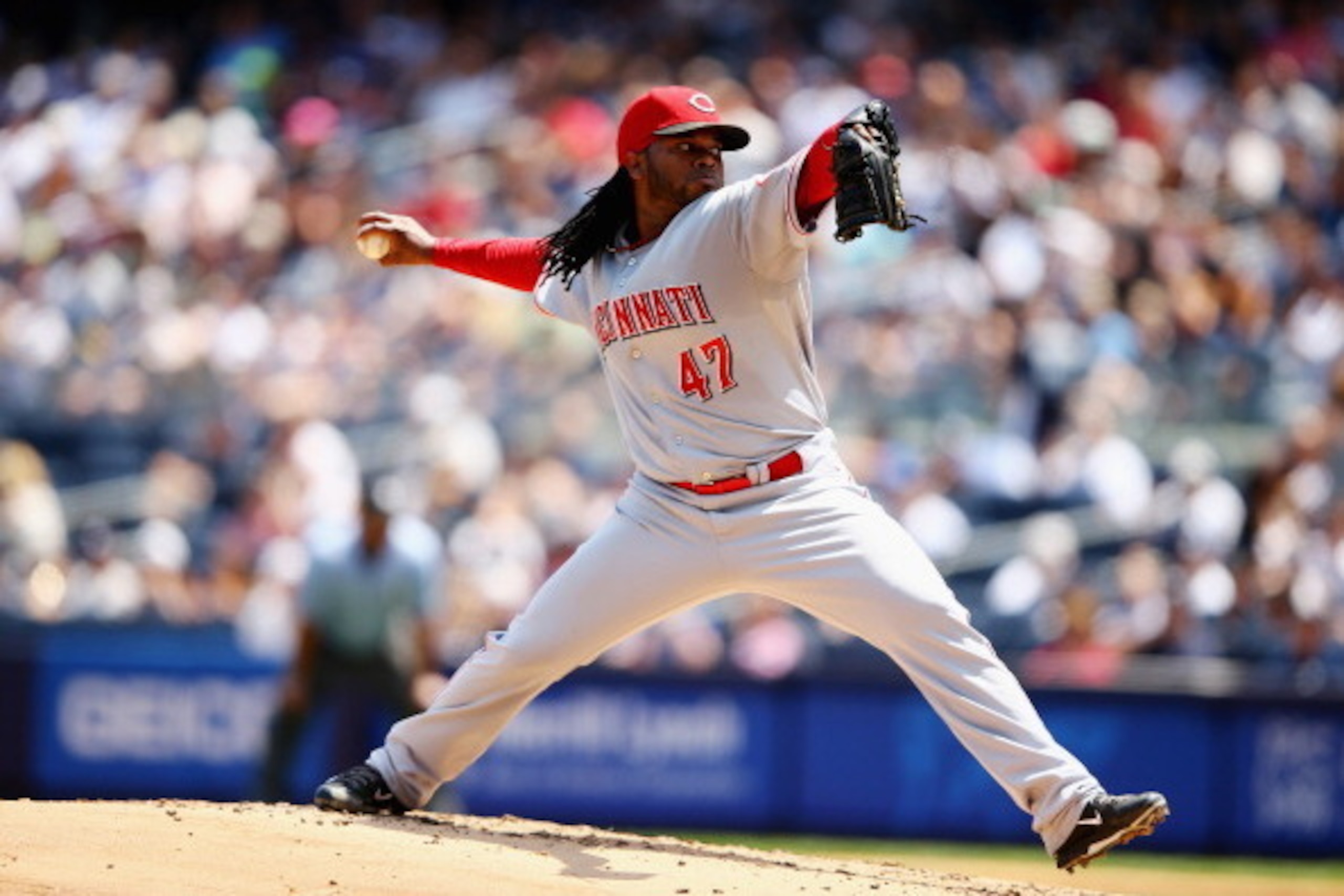NEW YORK, NY - JULY 20:  Johnny Cueto #47 of the Cincinnati Reds pitches against the New York Yankees during their game at Yankee Stadium on July 19, 2014 in the Bronx borough of New York City.  (Photo by Al Bello/Getty Images)