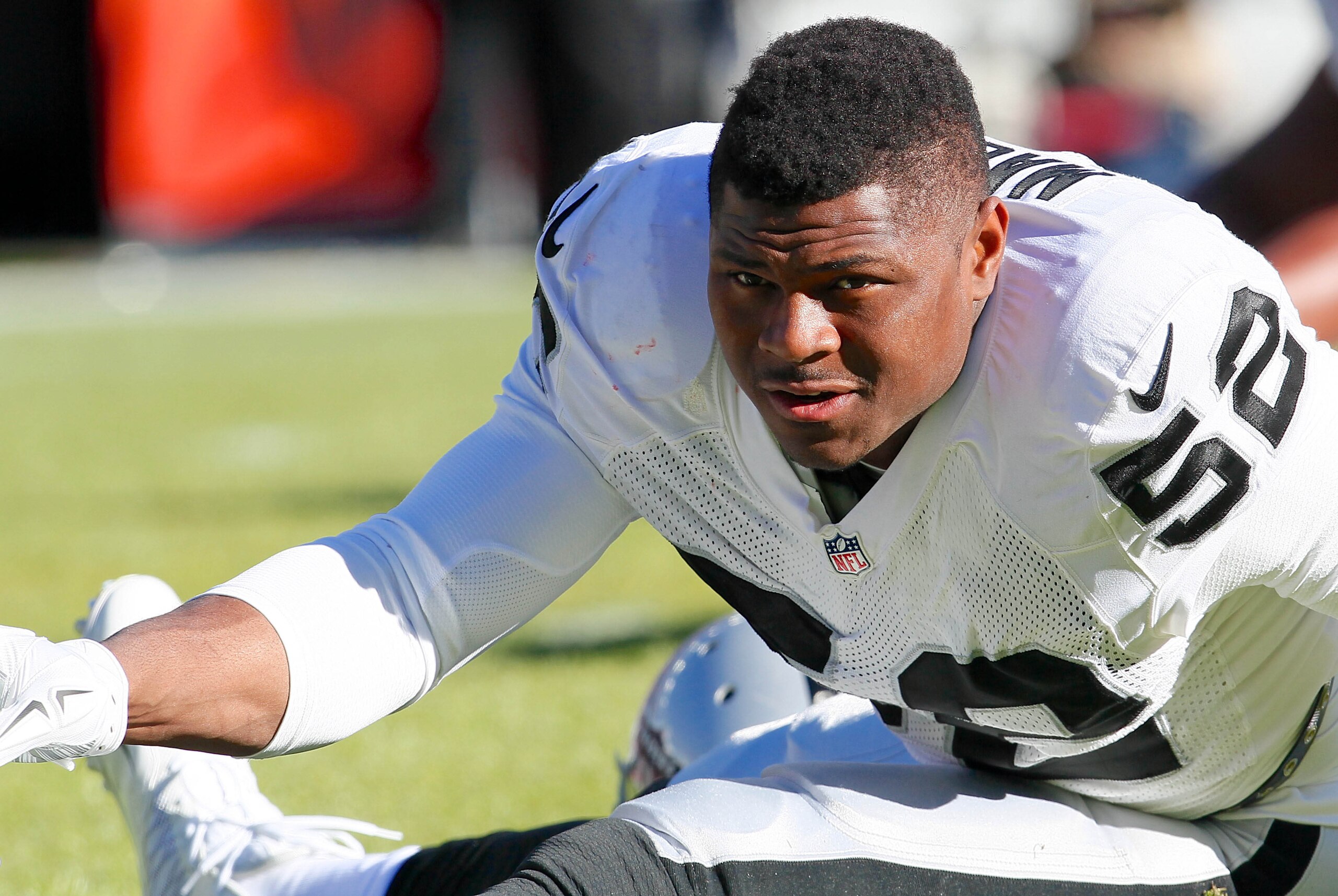 Dec 28, 2014; Denver, CO, USA; Oakland Raiders outside linebacker Khalil Mack (52) prior to the game against the Denver Broncos at Sports Authority Field at Mile High. The Broncos defeated the Raiders 47-14. Mandatory Credit: Isaiah J. Downing-USA TODAY S