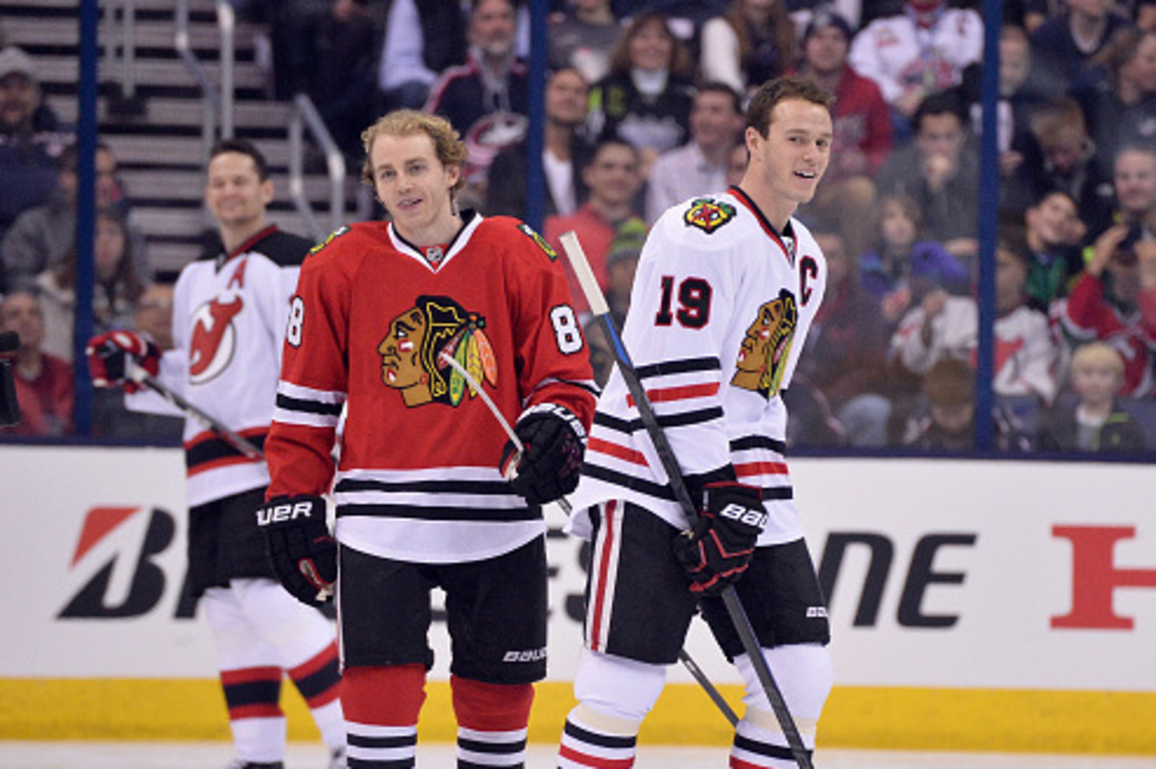COLUMBUS, OH - JANUARY 24:  Patrick Kane #88 of the Chicago Blackhawks and Team Foligno and Jonathan Toews #19 of the Chicago Blackhawks and Team Toews look on after the DraftKings NHL Accuracy Shooting event of the 2015 Honda NHL All-Star Skills Competit