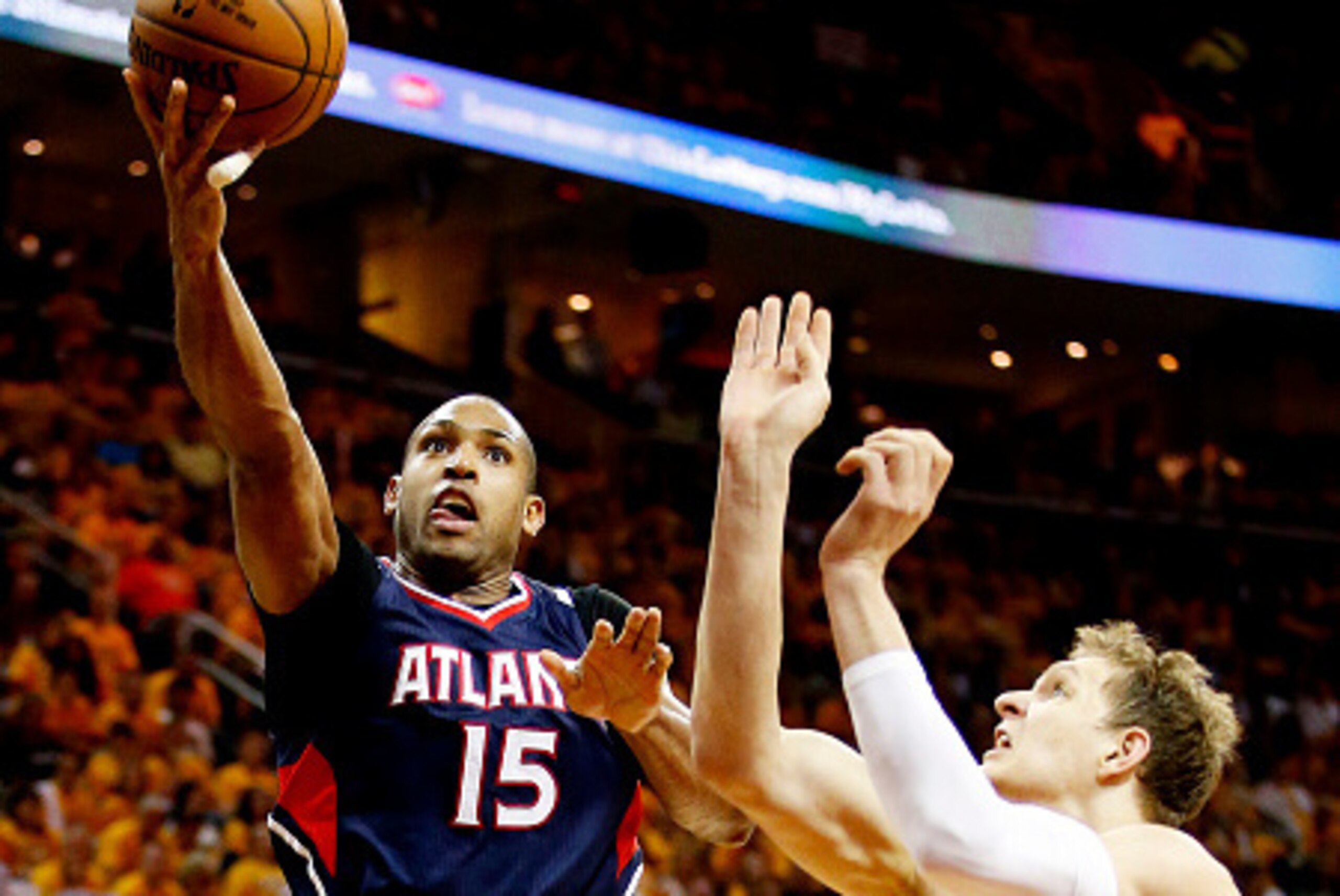 CLEVELAND, OH - MAY 24:  Al Horford #15 of the Atlanta Hawks shoots against Timofey Mozgov #20 of the Cleveland Cavaliers in the second quarter during Game Three of the Eastern Conference Finals of the 2015 NBA Playoffs at Quicken Loans Arena on May 24, 2
