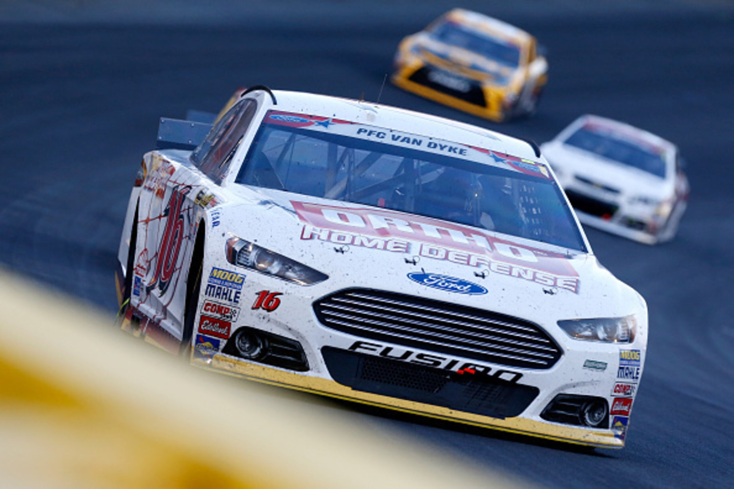 CHARLOTTE, NC - MAY 24: Greg Biffle, driver of the #16 Ortho Ford, leads a pack of cars during the NASCAR Sprint Cup Series Coca-Cola 600 at Charlotte Motor Speedway on May 24, 2015 in Charlotte, North Carolina.  (Photo by Brian Lawdermilk/Getty Images)