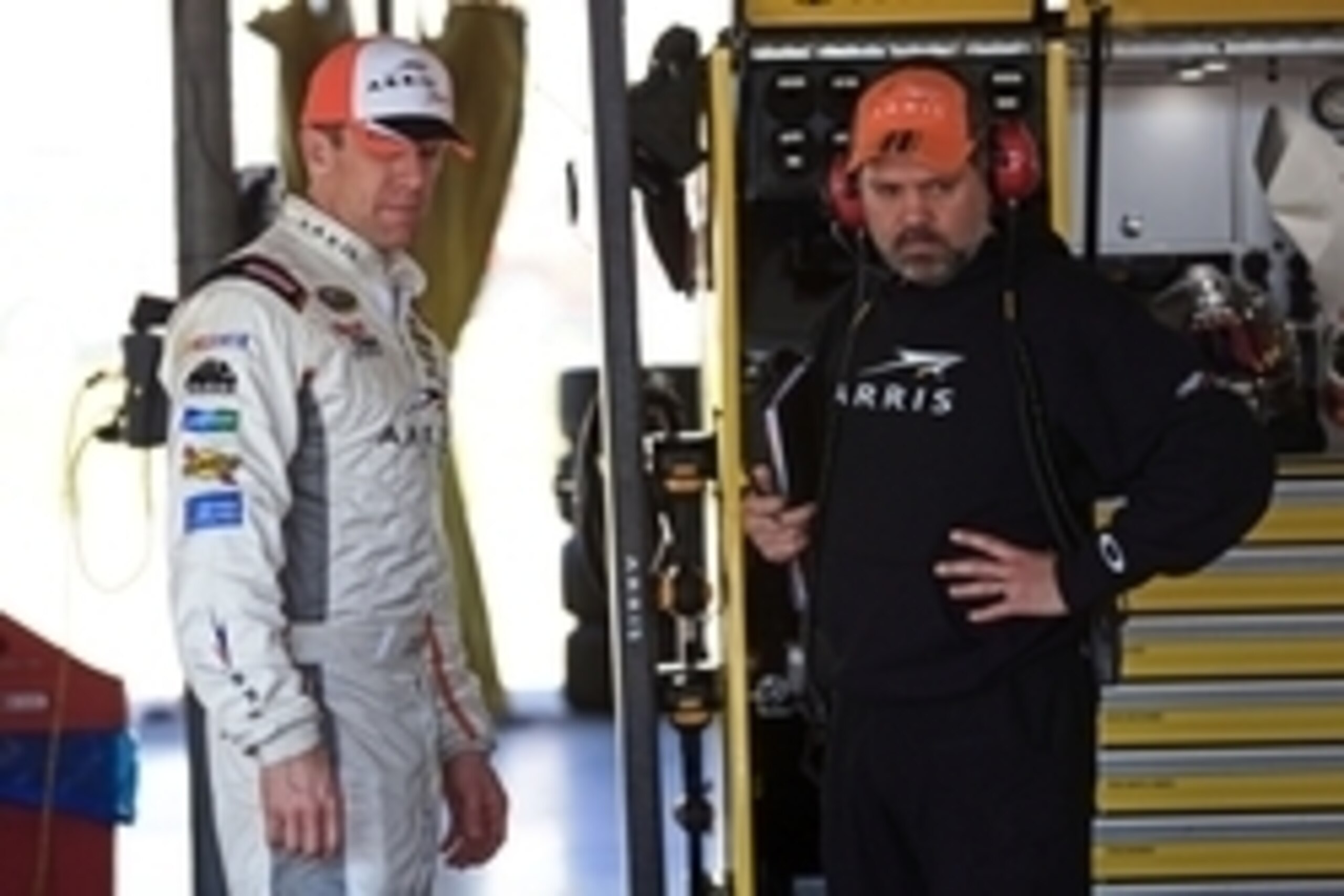 Feb 14, 2015; Daytona Beach, FL, USA; NASCAR Sprint Cup Series driver Carl Edwards (19) talks with crew chief Darian Grubb during practice for the Daytona 500 at Daytona International Speedway Mandatory Credit: Andrew Weber-USA TODAY Sports