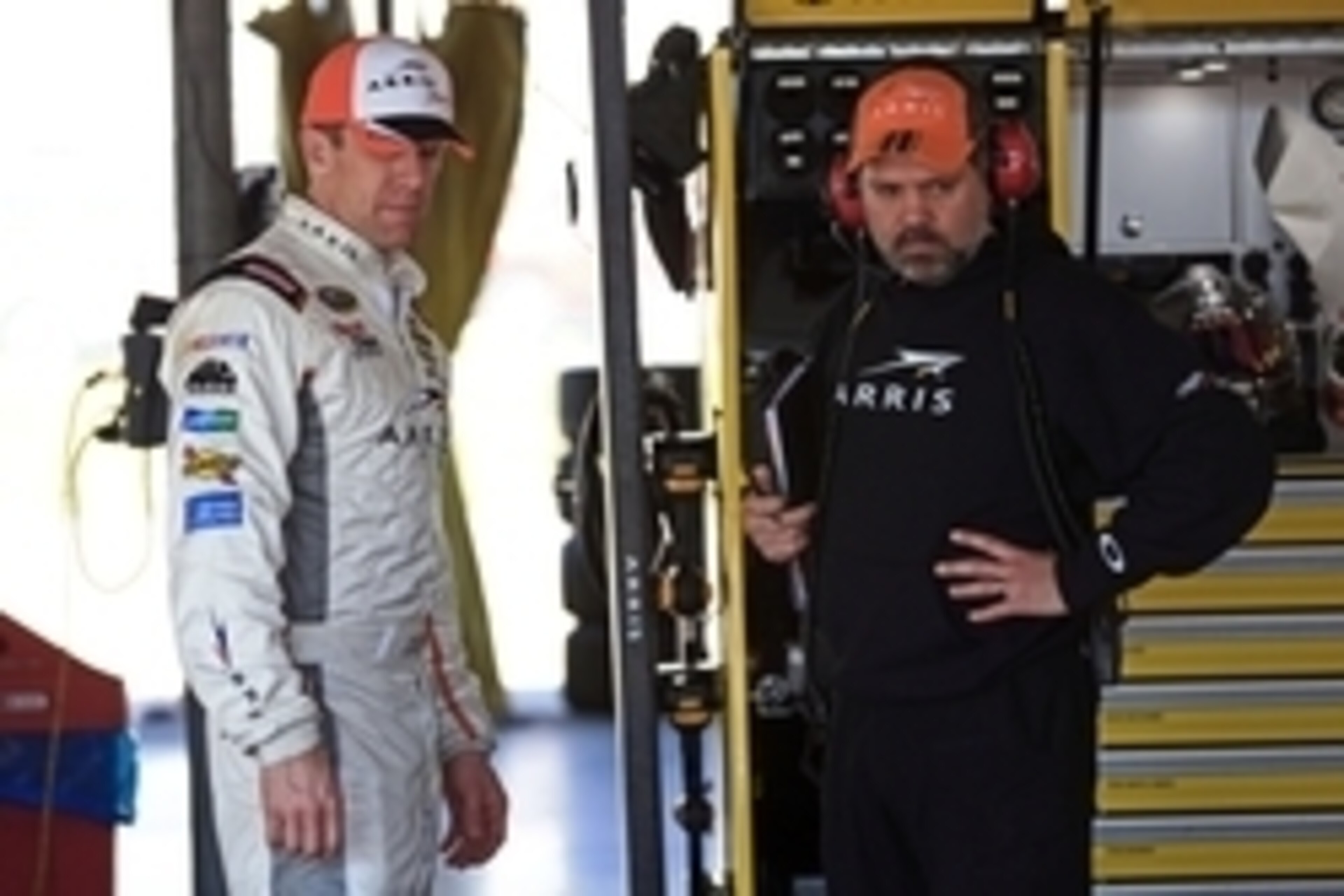 Feb 14, 2015; Daytona Beach, FL, USA; NASCAR Sprint Cup Series driver Carl Edwards (19) talks with crew chief Darian Grubb during practice for the Daytona 500 at Daytona International Speedway Mandatory Credit: Andrew Weber-USA TODAY Sports