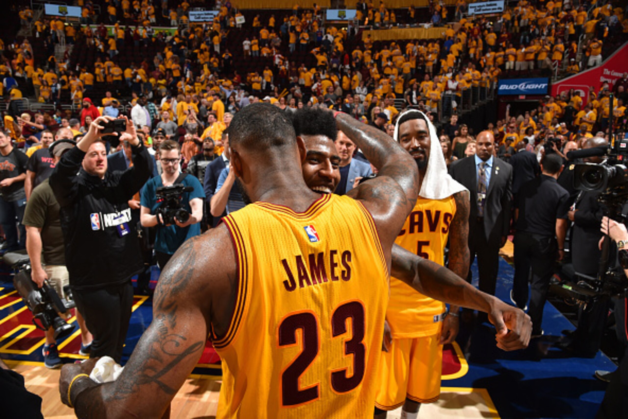 CLEVELAND,OH :  LeBron James #23 and Iman Shumpert #4 of the Cleveland Cavaliers shares a moment after the game against the Atlanta Hawks at the Quicken Loans Arena During Game Three of the Eastern Conference Finals during the 2015 NBA Playoffs on May 24,