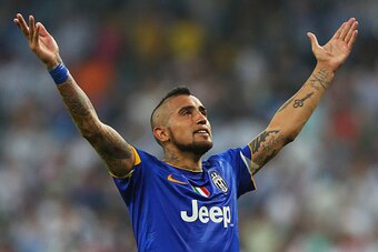 MADRID, SPAIN - MAY 13:  Arturo Vidal of Juventus celebates following his team's progression to the final during the UEFA Champions League Semi Final, second leg match between Real Madrid and Juventus at Estadio Santiago Bernabeu on May 13, 2015 in Madrid