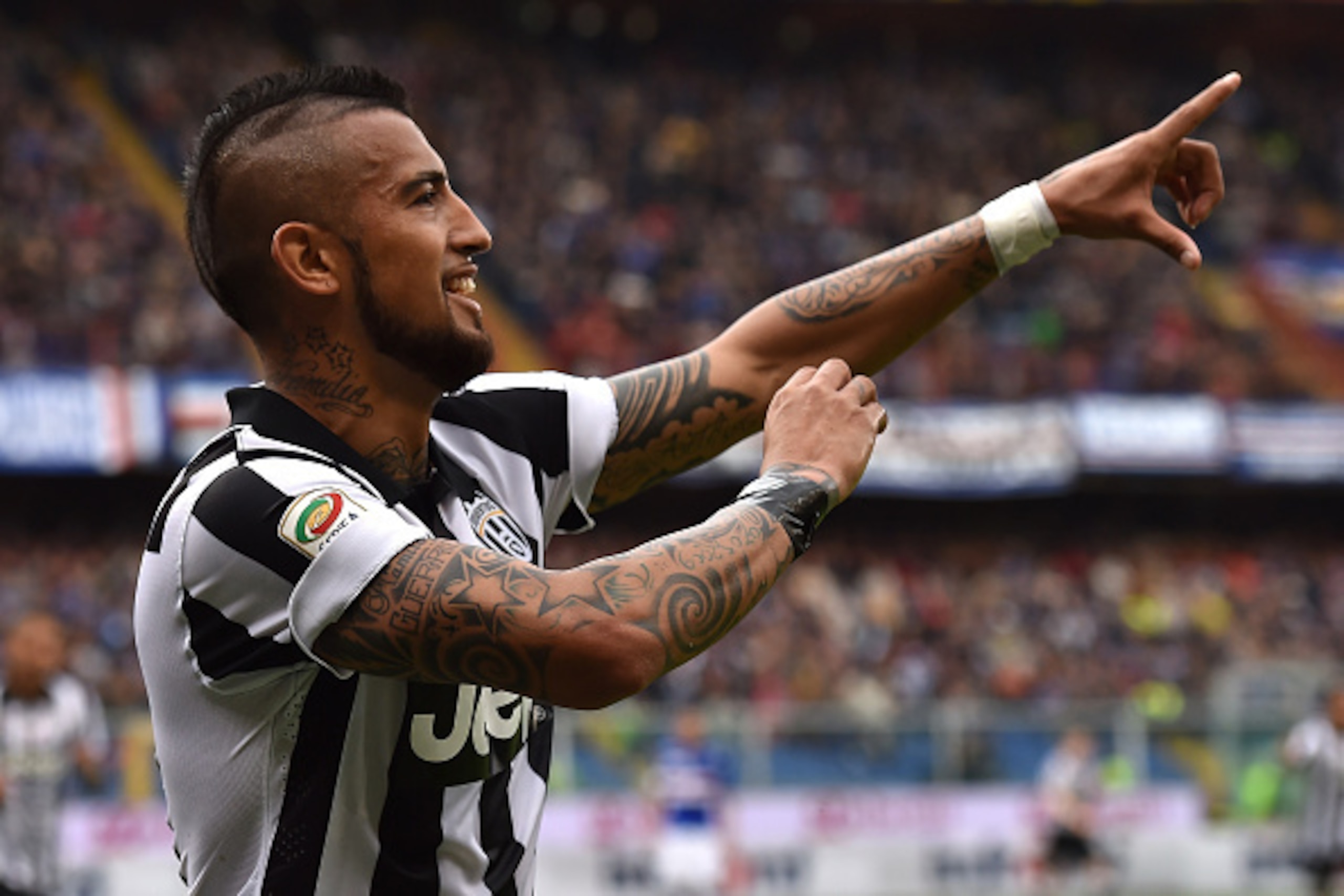 GENOA, ITALY - MAY 02:  Arturo Vidal of  Juventus FC celebrates after scoring the opening goal during the Serie A match between UC Sampdoria and Juventus FC at Stadio Luigi Ferraris on May 2, 2015 in Genoa, Italy.  (Photo by Valerio Pennicino/Getty Images