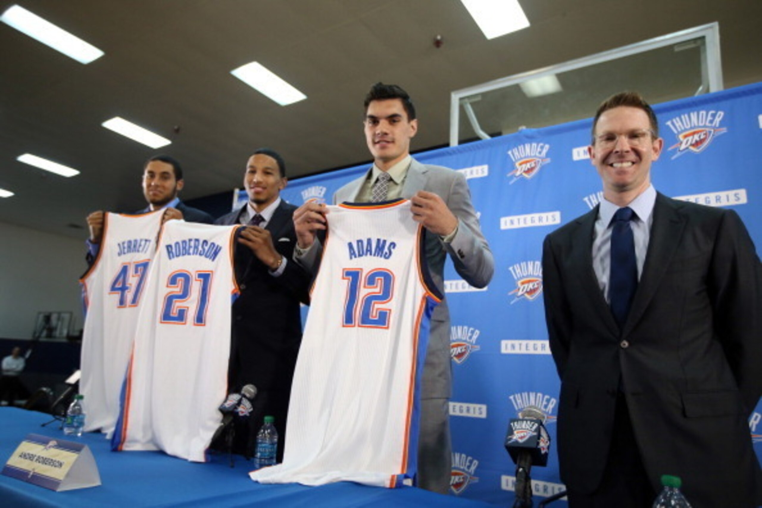 EDMOND, OK - JUNE 29: (L-R) NBA draftees Grant Jerrett, Andre Roberson, and Steven Adams of the Oklahoma City Thunder are introduced by Thunder Executive Vice President and General Manager Sam Presti on June 29, 2013 at the Thunder Events Center in Edmon EDMOND, OK - JUNE 29: (L-R) NBA draftees Grant Jerrett, Andre Roberson, and Steven Adams of the Oklahoma City Thunder are introduced by Thunder Executive Vice President and General Manager Sam Presti on June 29, 2013 at the Thunder Events Center in Edmon