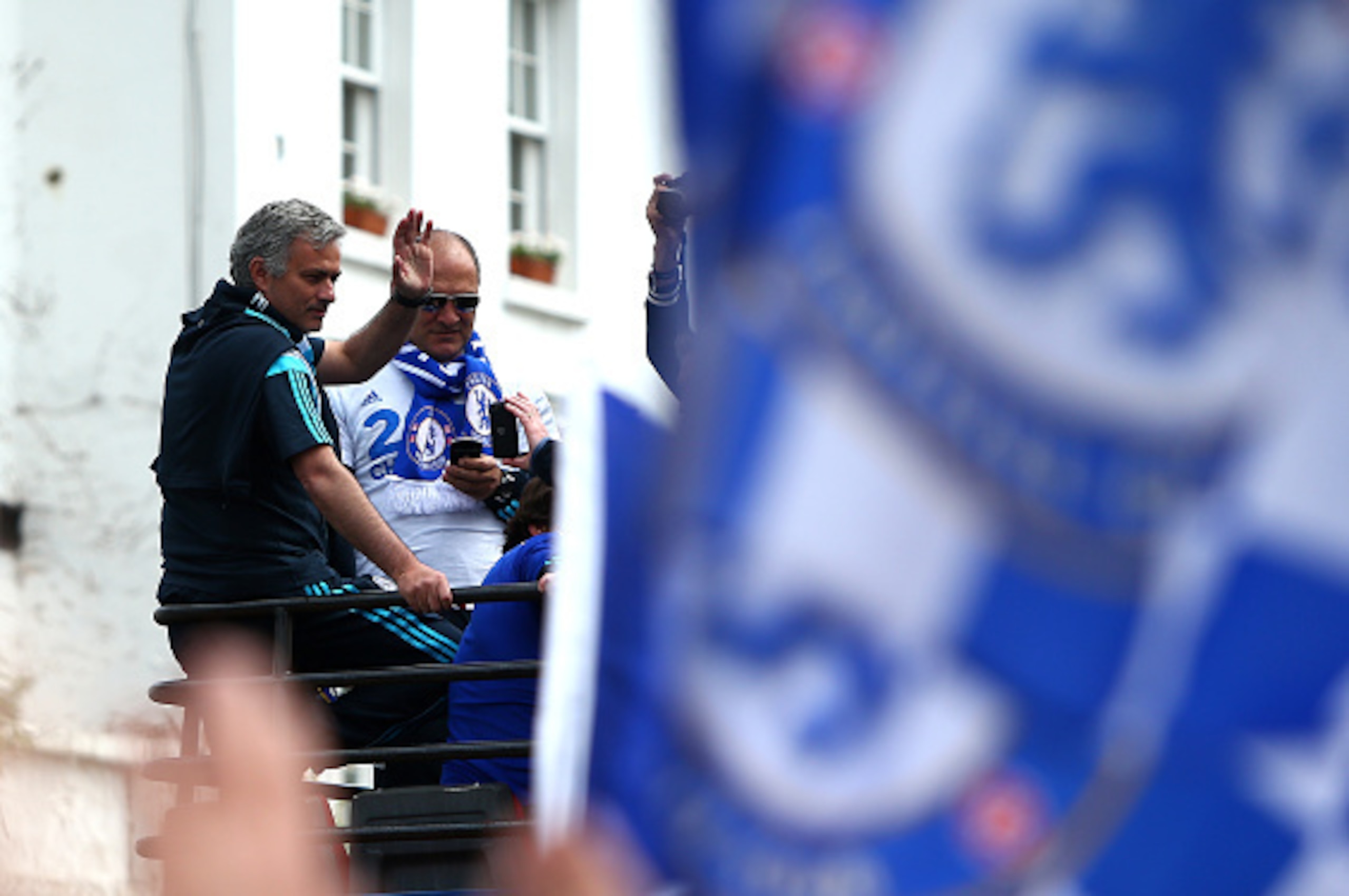 LONDON, ENGLAND - MAY 25: Chelsea manager Jose Mourinho waves to the Chelsea fans during the Chelsea FC Premier League Victory Parade on May 25, 2015 in London, England. (Photo by Charlie Crowhurst/Getty Images)