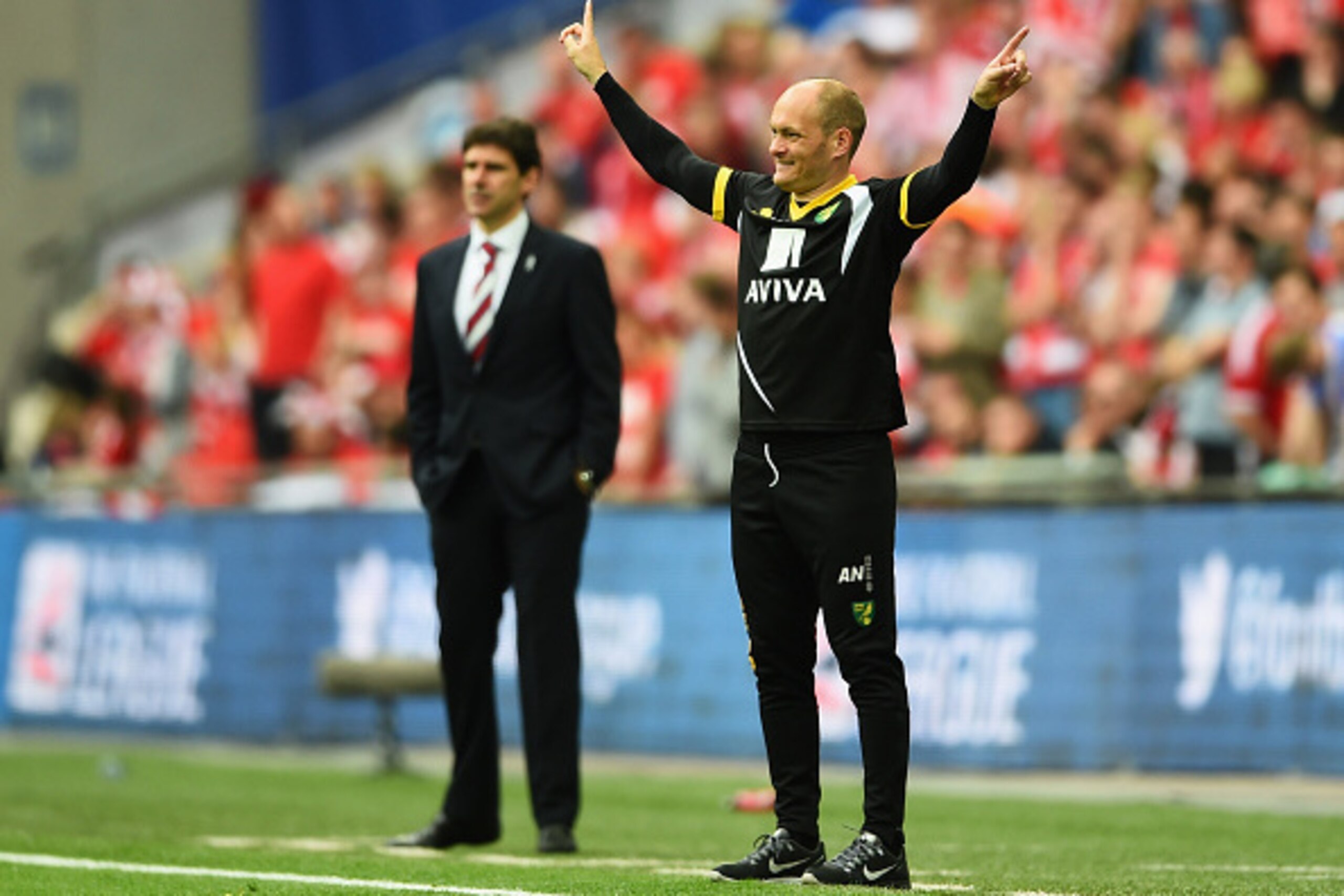 LONDON, ENGLAND - MAY 25:  Alex Neil manager of Norwich City signals as Aitor Karanka manager of Middlesbrough looks on during the Sky Bet Championship Playoff Final between Middlesbrough and Norwich City at Wembley Stadium on May 25, 2015 in London, Engl