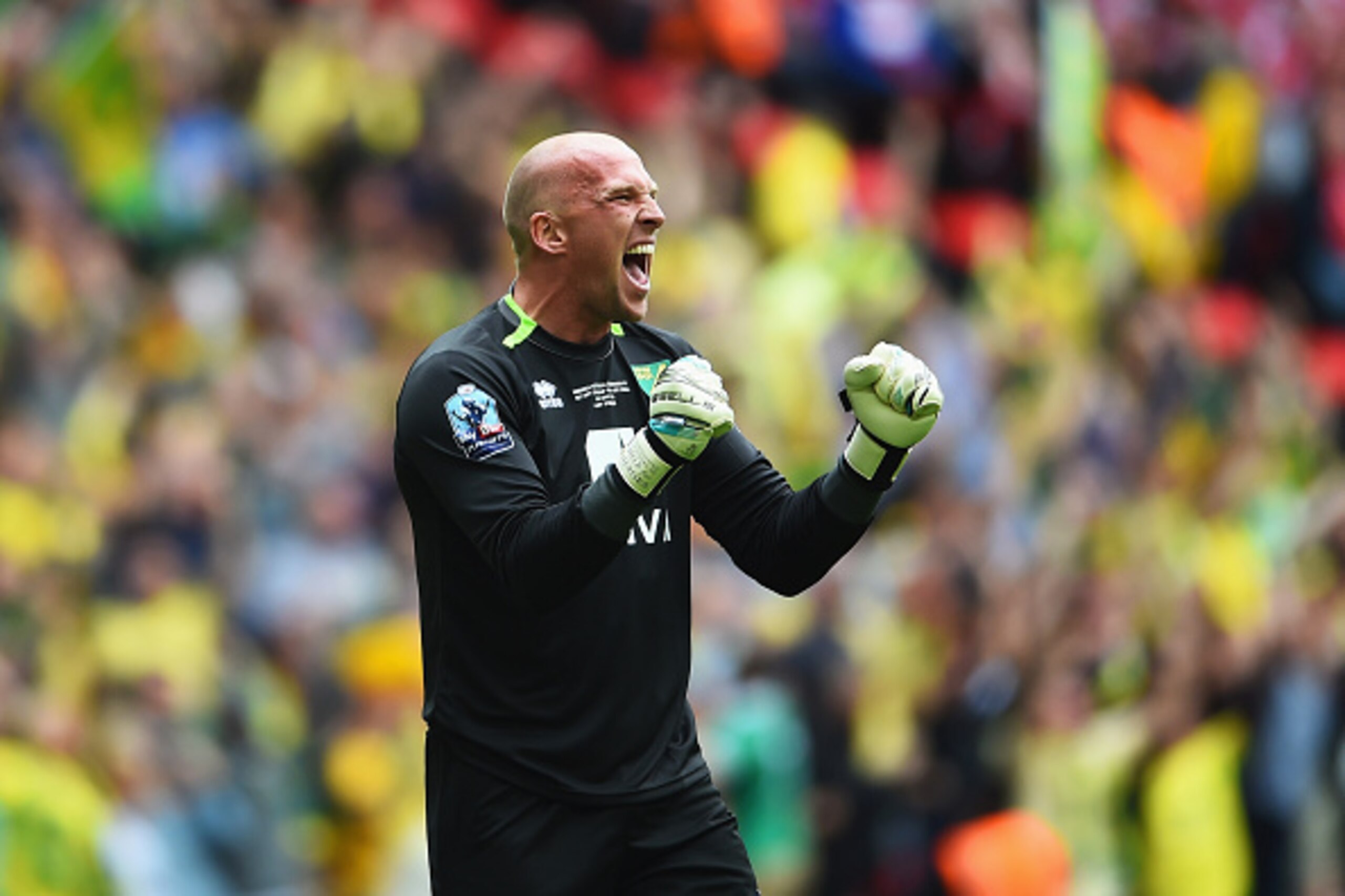 LONDON, ENGLAND - MAY 25:  John Ruddy of Norwich City celebrates as Nathan Redmond of Norwich City scores their second goal during the Sky Bet Championship Playoff Final between Middlesbrough and Norwich City at Wembley Stadium on May 25, 2015 in London, 
