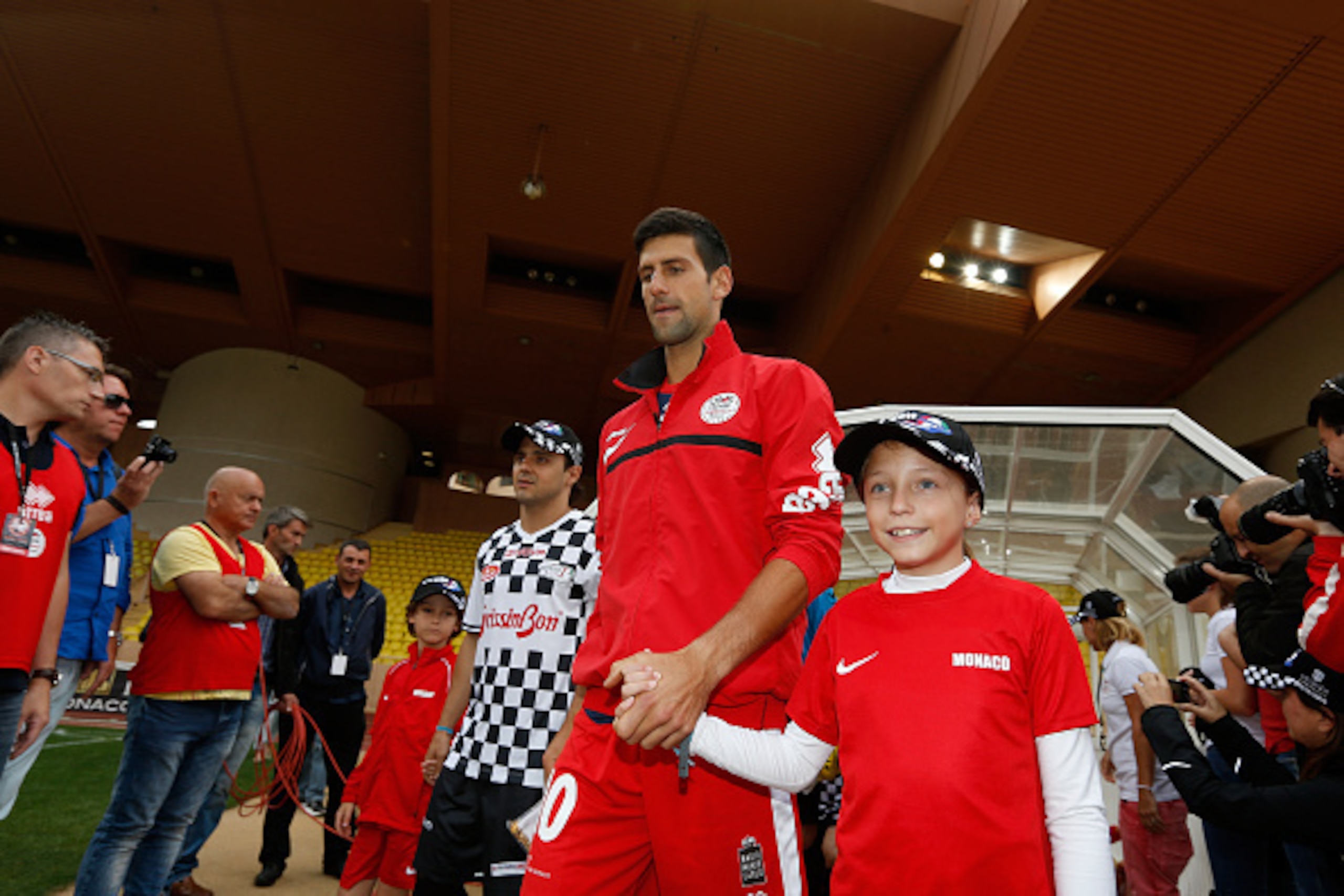 MONTE-CARLO, MONACO - MAY 19:  Formula One driver Felipe Massa (left) and tennis player Novak Djokovic (right) before the 22nd World Stars football match at the Stade Louis II in Monaco, before the  Formula One Grand Prix at Circuit de Monaco on May 19, 2