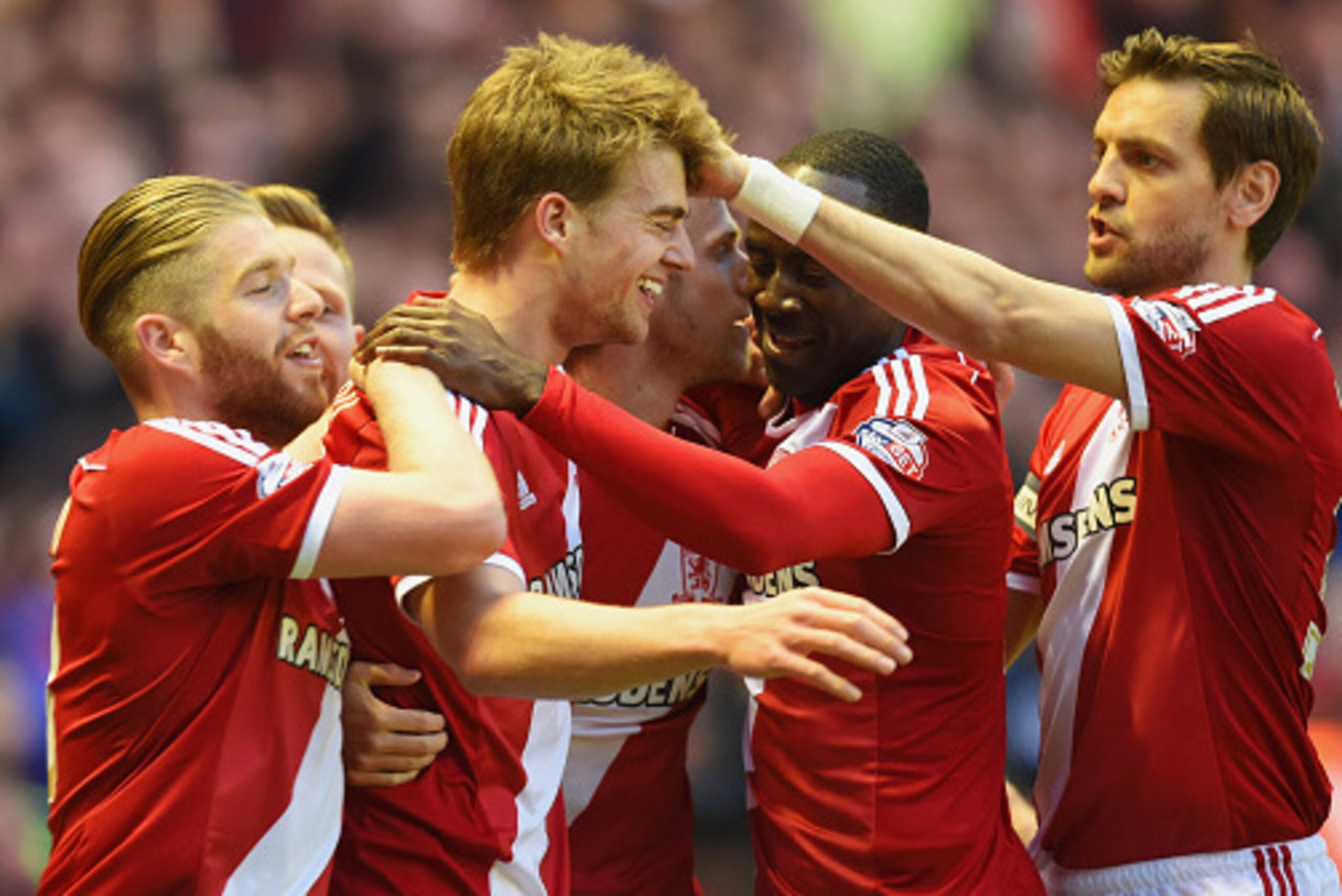MIDDLESBROUGH, ENGLAND - APRIL 14:  Patrick Bamford of Middlesbrough (3L) celebrates with team mates as he scores their second goal during the Sky Bet Championship match between Middlesbrough and Wolverhampton Wanderers at Riverside Stadium on April 14, 2