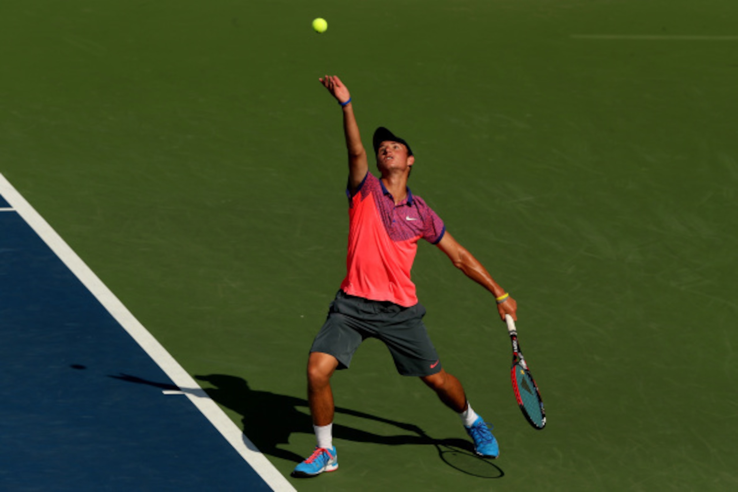 NEW YORK, NY - SEPTEMBER 07:  Omar Jasika of Australia serves Quentin Halys of France during their junior boys' singles final match on Day fourteen of the 2014 US Open at the USTA Billie Jean King National Tennis Center on September 7, 2014 in the Flushin