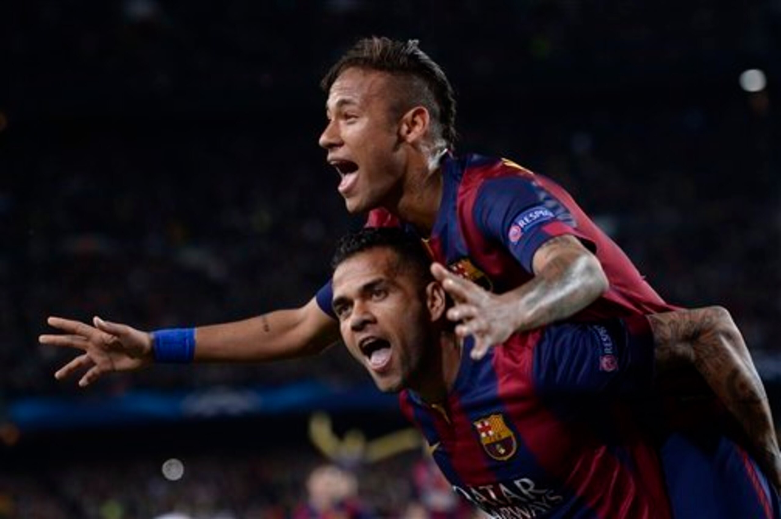 Dani Alves, bottom, celebrates with Neymar during a recent game. Dani Alves, bottom, celebrates with Neymar during a recent game.