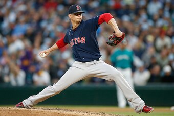 SEATTLE, WA - MAY 15:  Starting pitcher Clay Buchholz #11 of the Boston Red Sox pitches against the Seattle Mariners in the fourth inning at Safeco Field on May 15, 2015 in Seattle, Washington.  (Photo by Otto Greule Jr/Getty Images)