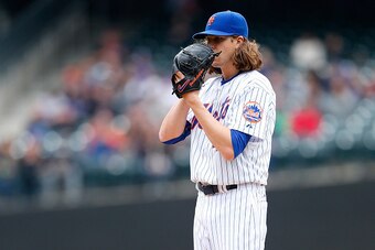 NEW YORK, NY - MAY 21:  Jacob deGrom #48 of the New York Mets pitches in the first inning against the St. Louis Cardinals at Citi Field on May 21, 2015 in the Flushing neighborhood of the Queens borough of New York City. Mets defeated the Cardinals 5-0.  