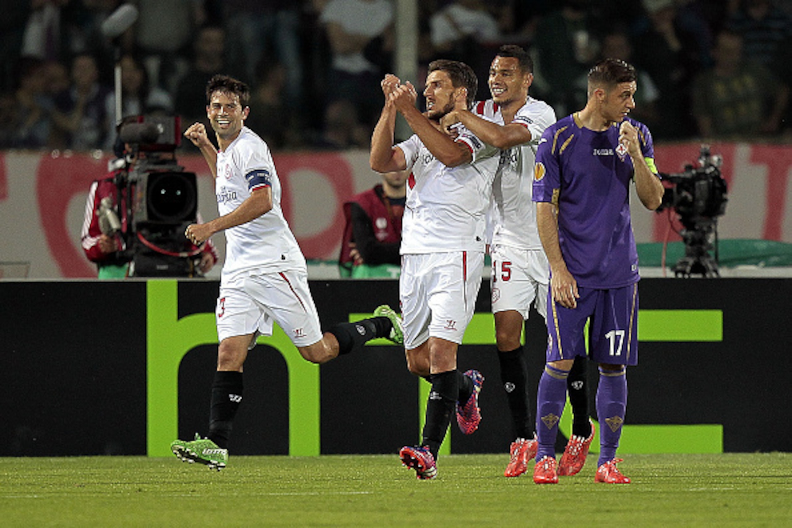 FLORENCE, ITALY - MAY 14: Daniel Carrico (C) of FC Sevilla celebrates after scoring a goal during the UEFA Europa League Semi Final match between ACF Fiorentina and FC Sevilla on May 14, 2015 in Florence, Italy. (Photo by Gabriele Maltinti/Getty Images) FLORENCE, ITALY - MAY 14: Daniel Carrico (C) of FC Sevilla celebrates after scoring a goal during the UEFA Europa League Semi Final match between ACF Fiorentina and FC Sevilla on May 14, 2015 in Florence, Italy. (Photo by Gabriele Maltinti/Getty Images)