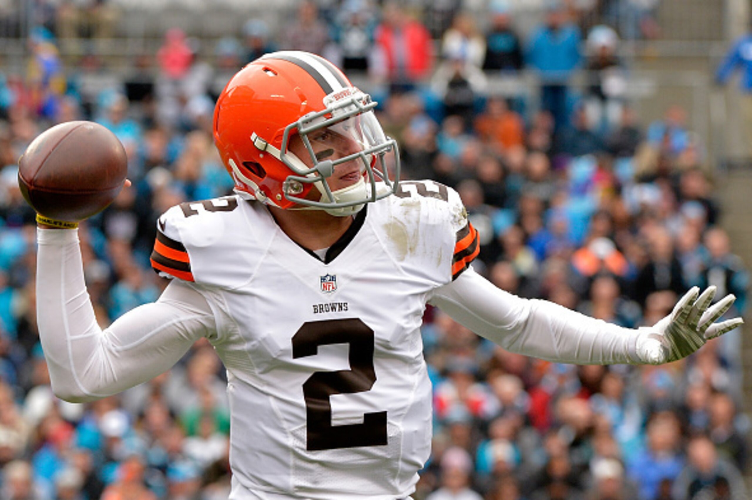 CHARLOTTE, NC - DECEMBER 21: Johnny Manziel #2 of the Cleveland Browns drops back to pass against the Carolina Panthers during their game at Bank of America Stadium on December 21, 2014 in Charlotte, North Carolina. (Photo by Grant Halverson/Getty Image CHARLOTTE, NC - DECEMBER 21: Johnny Manziel #2 of the Cleveland Browns drops back to pass against the Carolina Panthers during their game at Bank of America Stadium on December 21, 2014 in Charlotte, North Carolina. (Photo by Grant Halverson/Getty Image