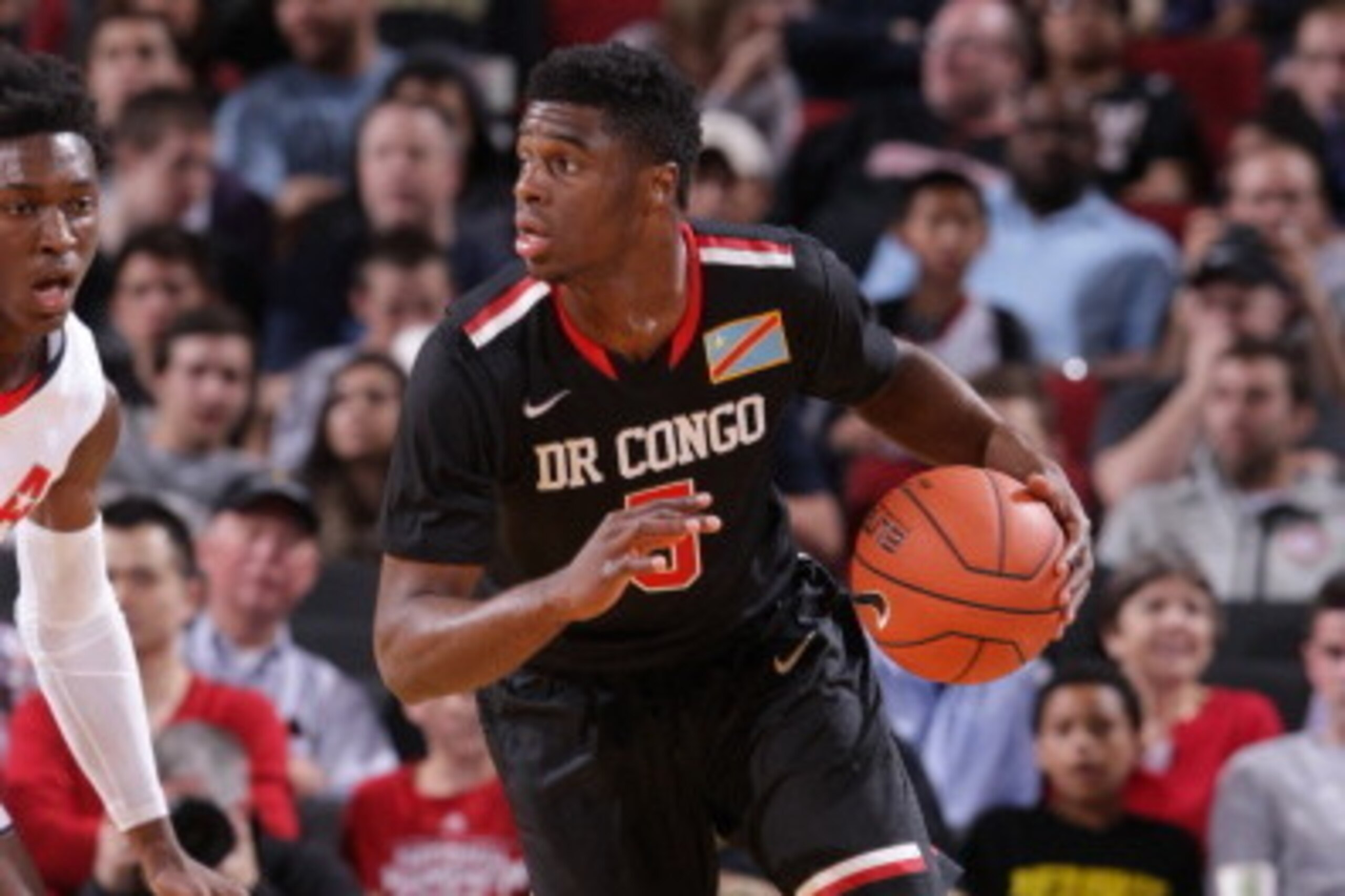 PORTLAND, OR - APRIL 12:  Emmanuel Mudiay #5 of the World Team dribbles the ball during the game against Team USA on April 12, 2014 at the Moda Center Arena in Portland, Oregon. NOTE TO USER: User expressly acknowledges and agrees that, by downloading and
