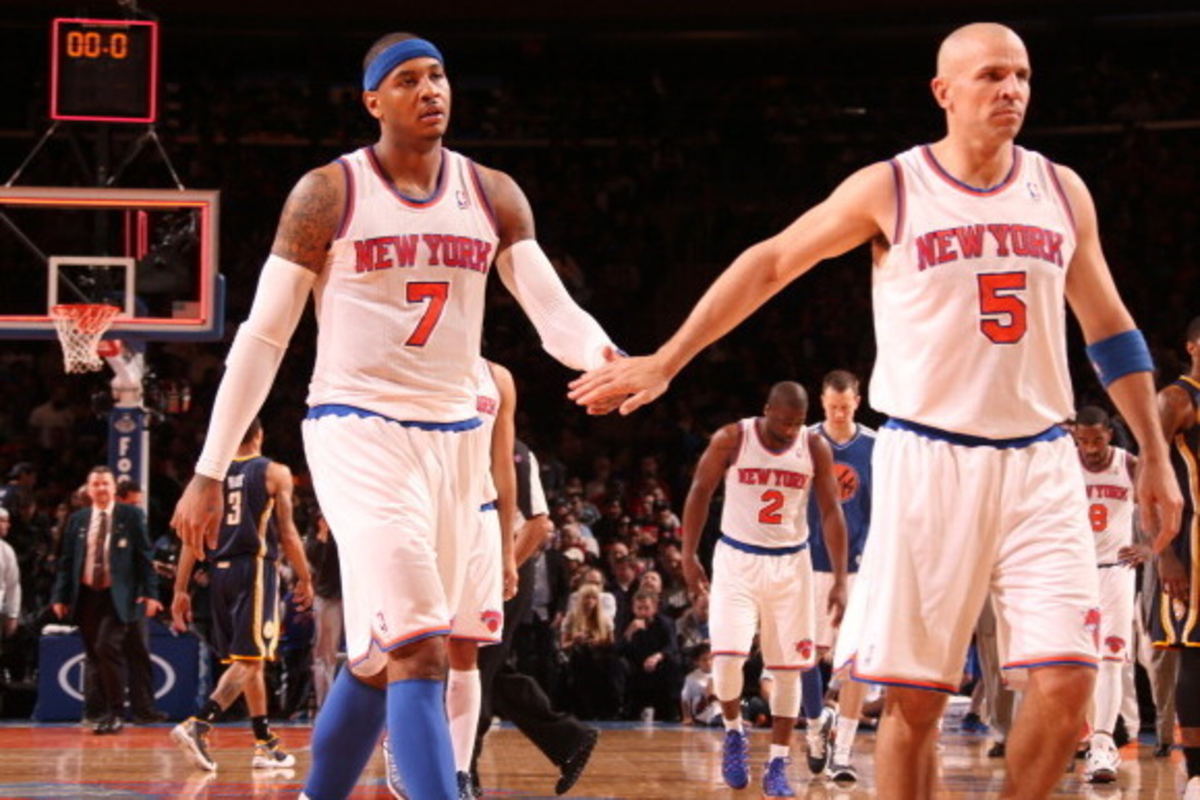NEW YORK, NY - APRIL 14: Carmelo Anthony #7 of the New York Knicks high-fives teammate Jason Kidd #5 during a game against the Indiana Pacers on April 14, 2013 at Madison Square Garden in New York City.  NOTE TO USER: User expressly acknowledges and agree