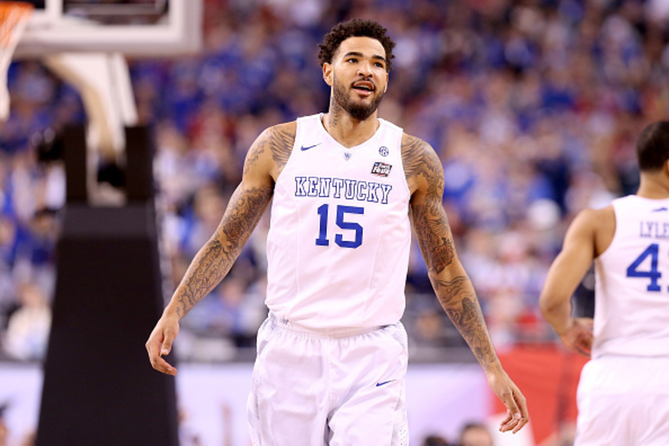 INDIANAPOLIS, IN - APRIL 04: Willie Cauley-Stein #15 of the Kentucky Wildcats reacts after a dunk in the first half against the Wisconsin Badgers during the NCAA Men's Final Four Semifinal at Lucas Oil Stadium on April 4, 2015 in Indianapolis, Indiana.  (