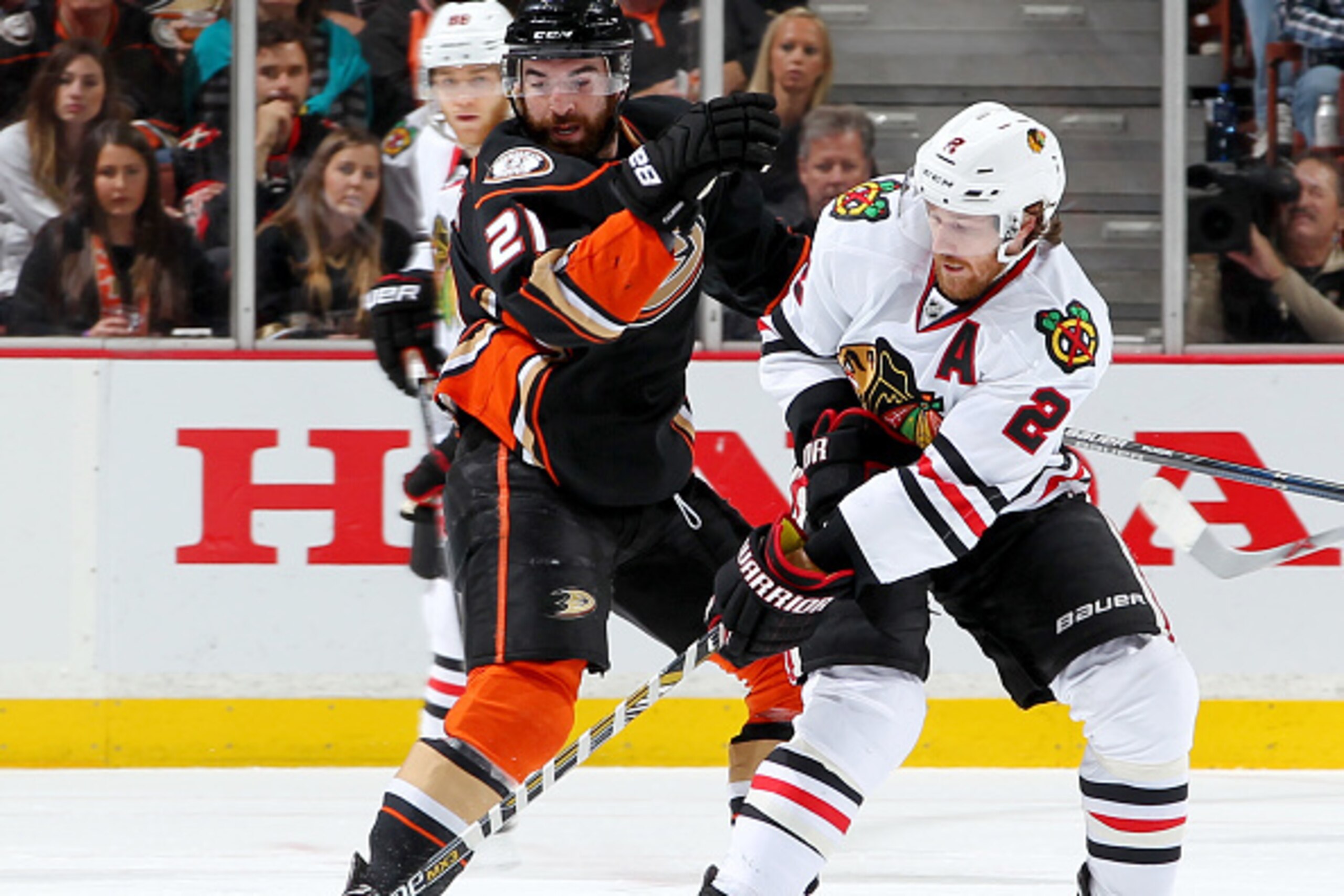 ANAHEIM, CA - MAY 25:  Kyle Palmieri #21 of the Anaheim Ducks battle for the puck against Duncan Keith #2 of the Chicago Blackhawks in Game Five of the Western Conference Finals during the 2015 NHL Stanley Cup Playoffs at Honda Center on May 25, 2015 in A