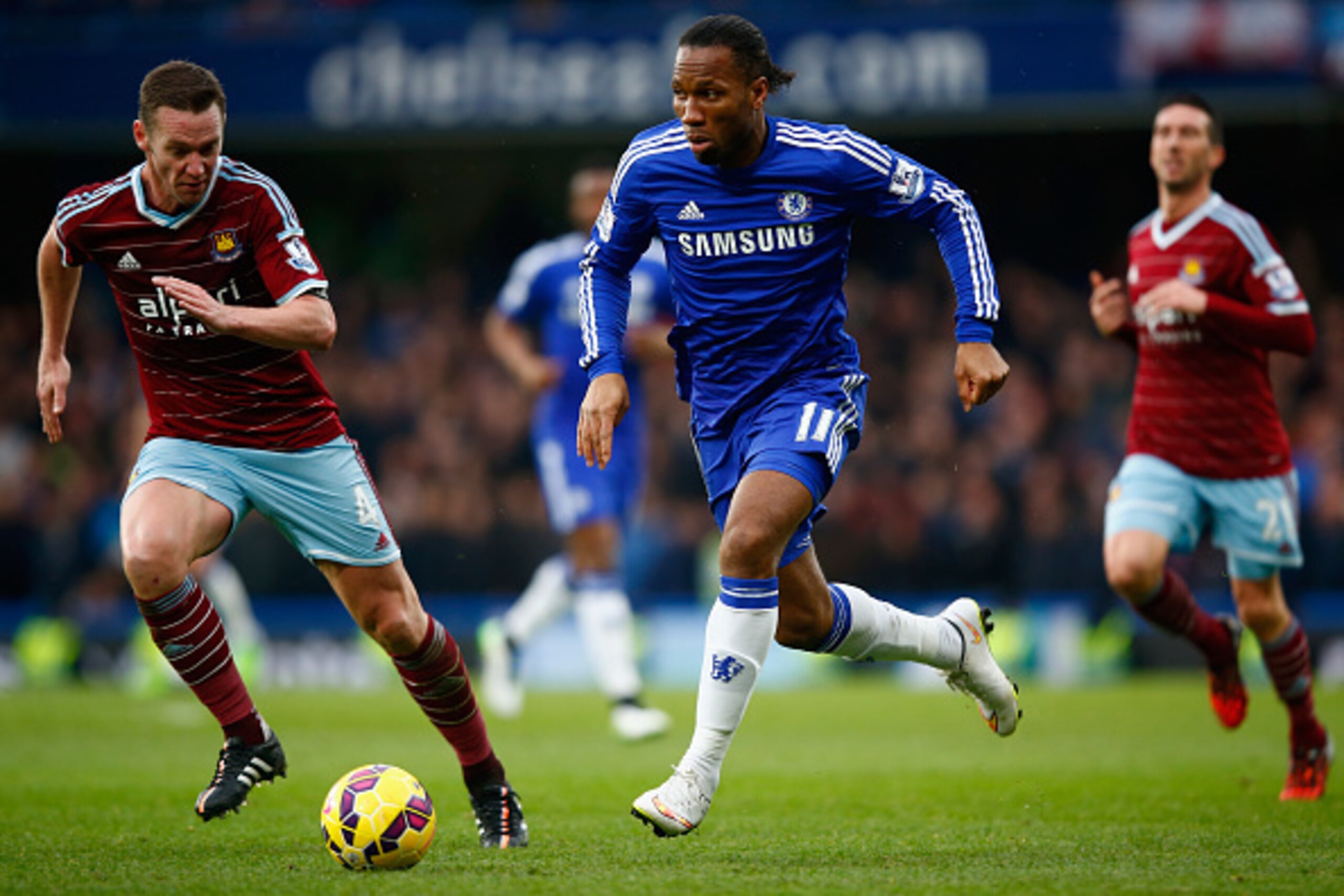 LONDON, ENGLAND - DECEMBER 26: Kevin Nolan of West Ham marshalls Didier Drogba of Chelsea during the Barclays Premier League match between Chelsea and West Ham United at Stamford Bridge on December 26, 2014 in London, England. (Photo by Clive Rose/Getty LONDON, ENGLAND - DECEMBER 26: Kevin Nolan of West Ham marshalls Didier Drogba of Chelsea during the Barclays Premier League match between Chelsea and West Ham United at Stamford Bridge on December 26, 2014 in London, England. (Photo by Clive Rose/Getty