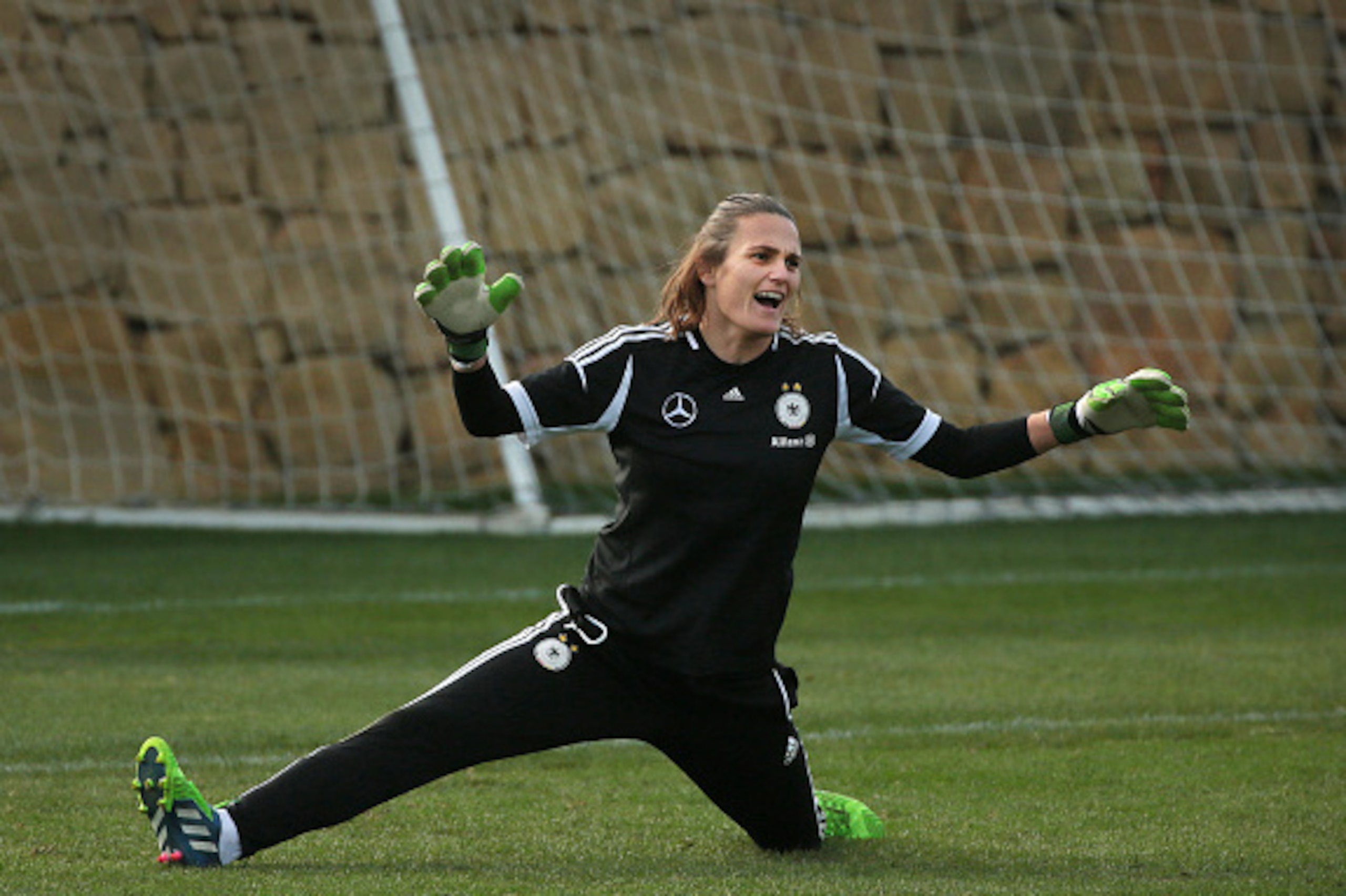 MARBELLA, SPAIN - FEBRUARY 09:  Goalkeeper Nadine Angerer reacts during a Germany Women's Training Session at Marbella Football Center on February 9, 2015 in Marbella, Spain.  (Photo by Sergio Camacho/Getty Images)