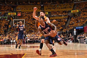 CLEVELAND,OH :  Jeff Teague #0 of the Atlanta Hawks goes up for the layup against the Cleveland Cavaliers at the Quicken Loans Arena During Game Three of the Eastern Conference Finals during the 2015 NBA Playoffs on May 24, 2015 in Cleveland,OhioNOTE TO U
