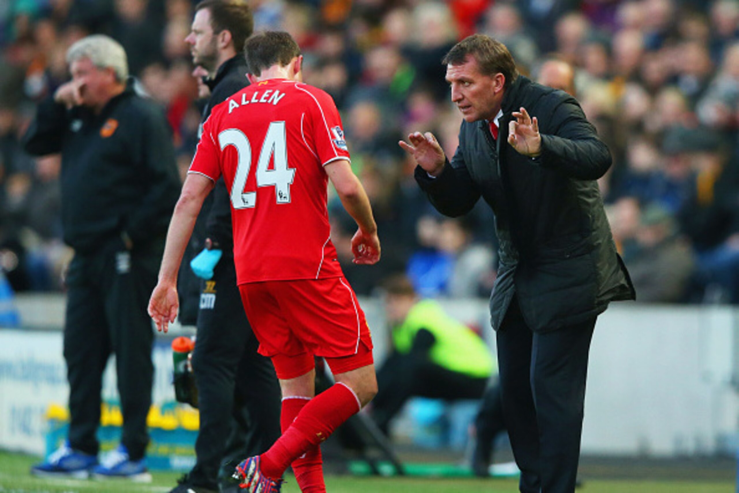 HULL, ENGLAND - APRIL 28:  Brendan Rodgers manager of Liverpool gives instructions to Joe Allen of Liverpool during the Barclays Premier League match between Hull City and Liverpool at KC Stadium on April 28, 2015 in Hull, England.  (Photo by Alex Livesey