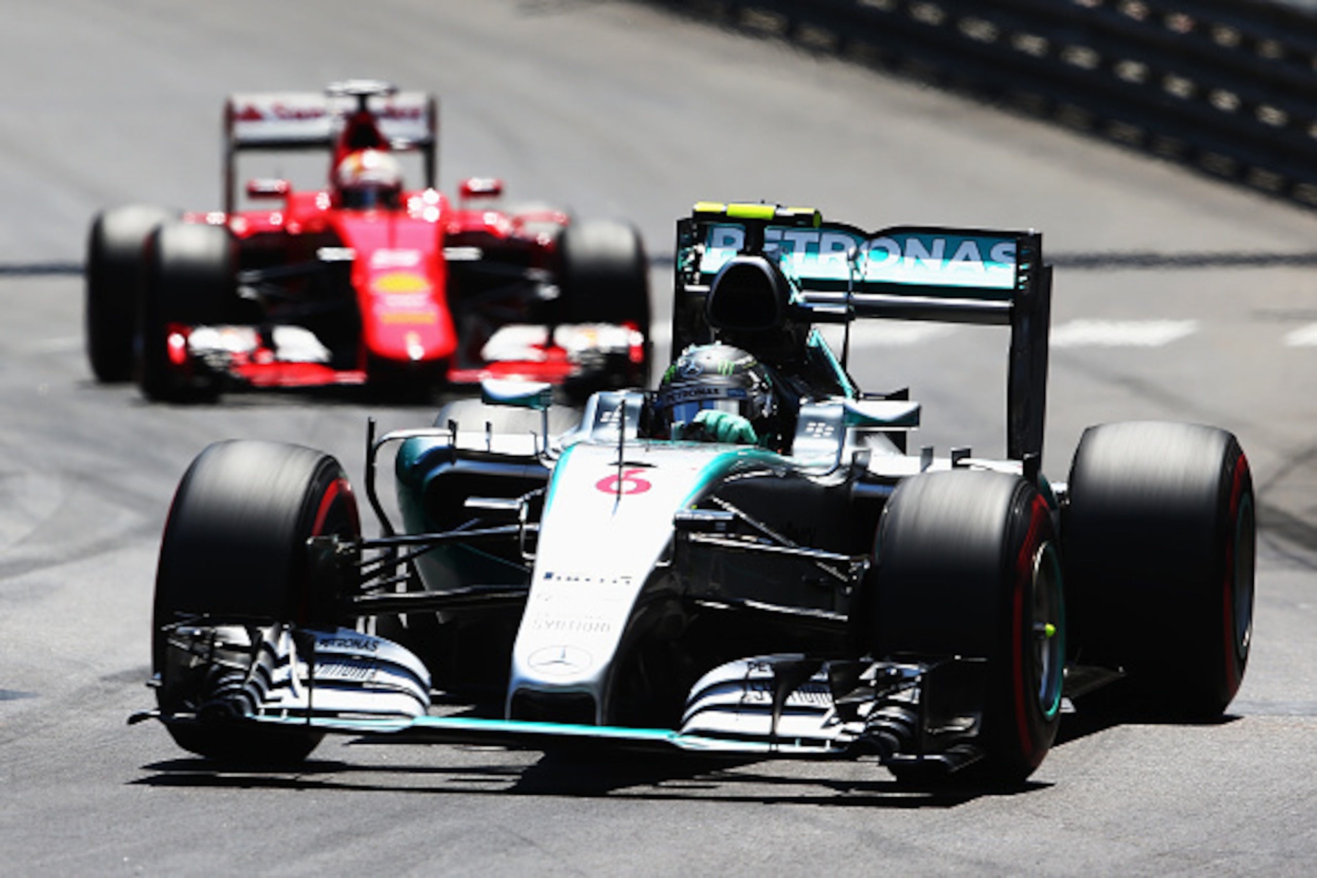 MONTE-CARLO, MONACO - MAY 24:  Nico Rosberg of Germany and Mercedes GP leads from Sebastian Vettel of Germany and Ferrari during the Monaco Formula One Grand Prix at Circuit de Monaco on May 24, 2015 in Monte-Carlo, Monaco.  (Photo by Mark Thompson/Getty 