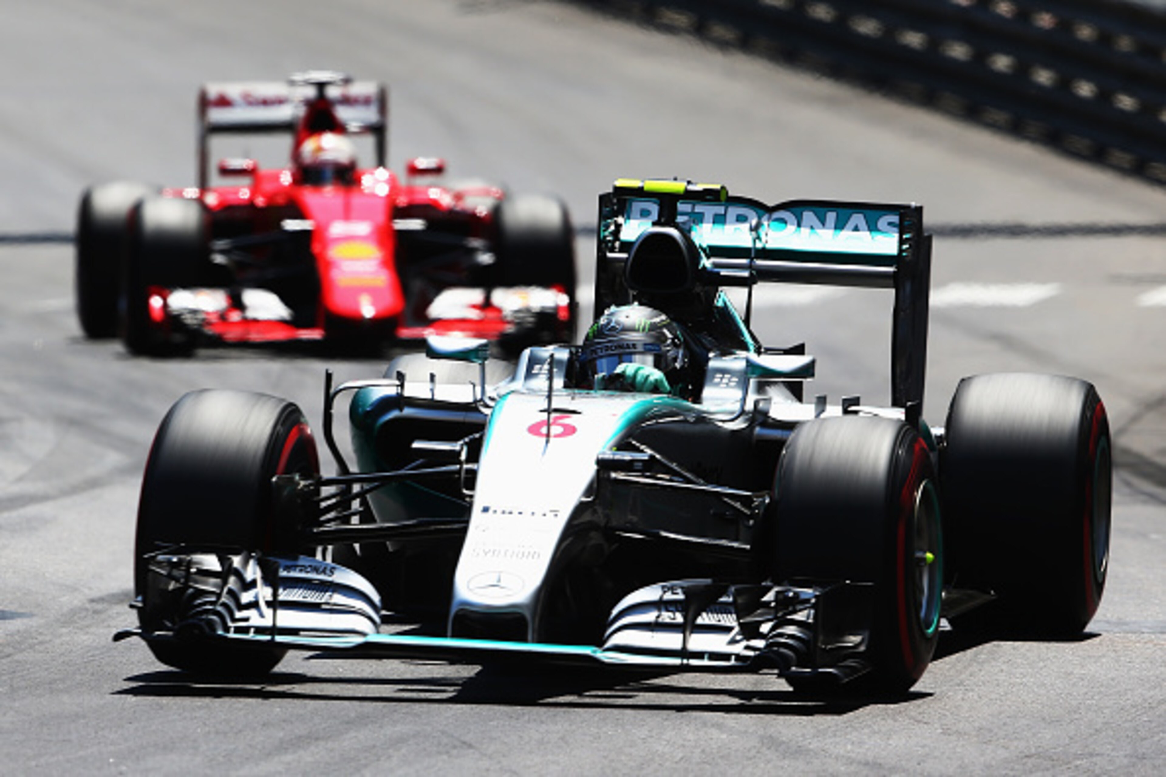 MONTE-CARLO, MONACO - MAY 24:  Nico Rosberg of Germany and Mercedes GP leads from Sebastian Vettel of Germany and Ferrari during the Monaco Formula One Grand Prix at Circuit de Monaco on May 24, 2015 in Monte-Carlo, Monaco.  (Photo by Mark Thompson/Getty 