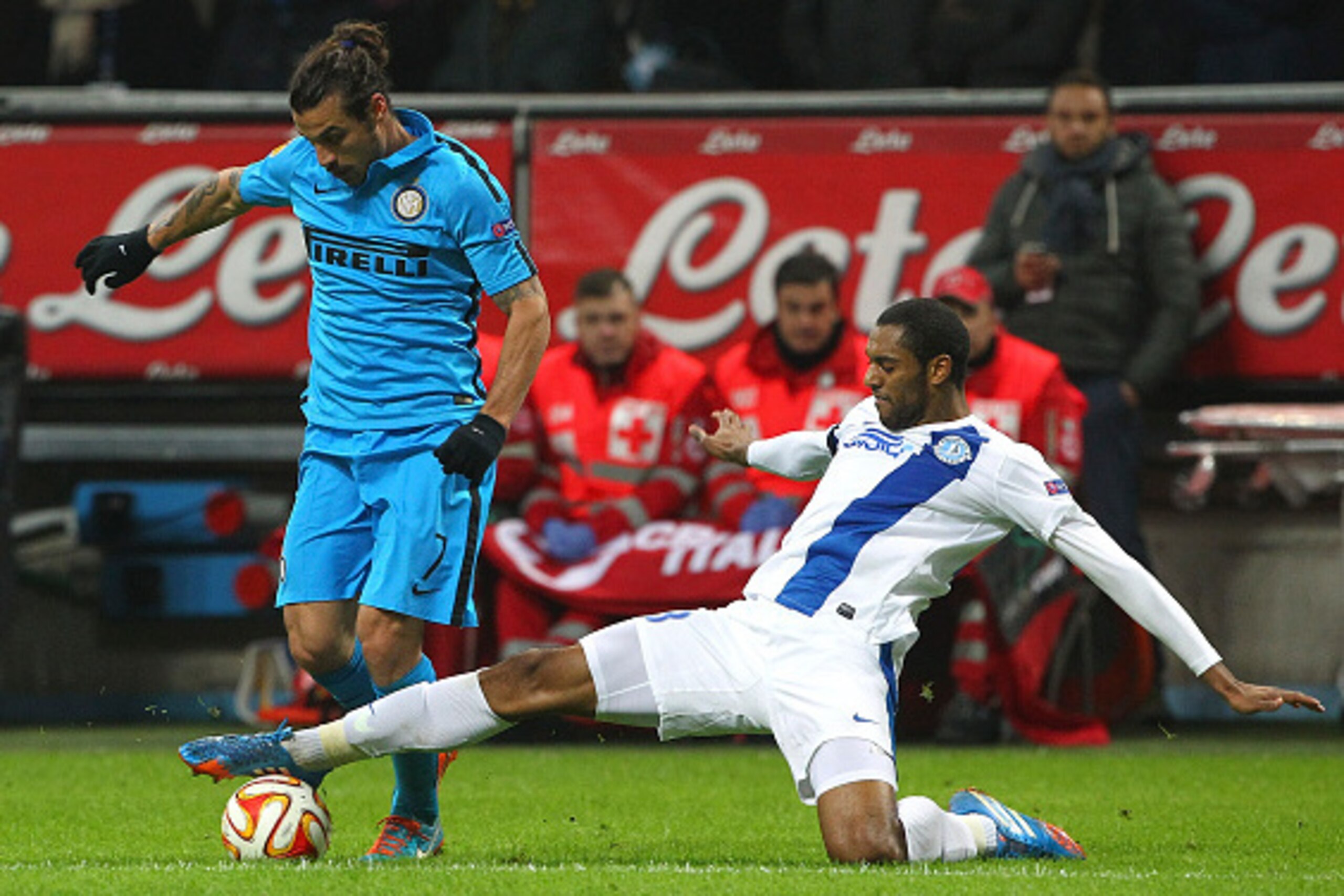 MILAN, ITALY - NOVEMBER 27: Pablo Daniel Osvaldo of FC Internazionale Milano is challenged by Douglas of FC Dnipro Dnipropetrovsk during the UEFA Europa League Group F match between FC Internazionale Milano and FC Dnipro Dnipropetrovsk on November 27, 20 MILAN, ITALY - NOVEMBER 27: Pablo Daniel Osvaldo of FC Internazionale Milano is challenged by Douglas of FC Dnipro Dnipropetrovsk during the UEFA Europa League Group F match between FC Internazionale Milano and FC Dnipro Dnipropetrovsk on November 27, 20