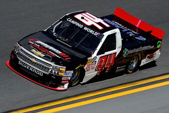 DAYTONA BEACH, FL - FEBRUARY 19:  Travis Kvapil, driver of the #94 Chargebacks 911 Chevrolet, practices for the NASCAR Camping World Truck Series NextEra Energy Resources 250 at Daytona International Speedway on February 19, 2015 in Daytona Beach, Florida