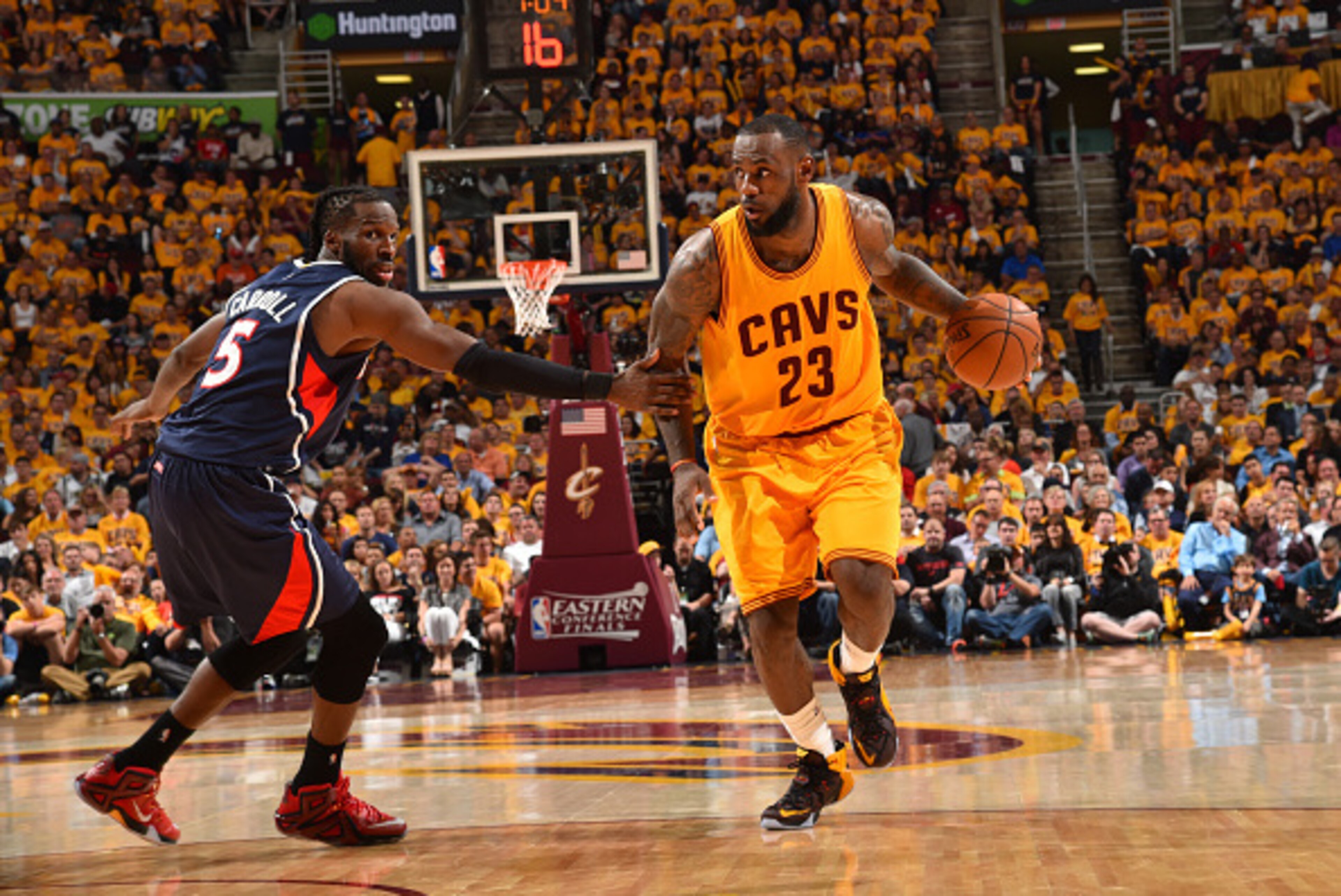 CLEVELAND,OH :  LeBron James #23 of the Cleveland Cavaliers drives to the basket against the Atlanta Hawks at the Quicken Loans Arena During Game Three of the Eastern Conference Finals during the 2015 NBA Playoffs on May 24, 2015 in Cleveland,Ohio NOTE TO