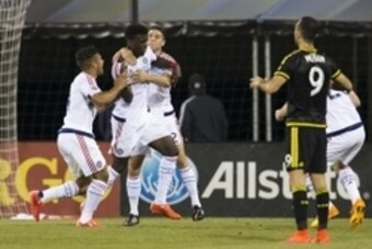 May 22, 2015; Columbus, OH, USA; Chicago Fire forward Jason Johnson (7) celebrates after scoring the tying goal of the game as Columbus Crew SC forward Justin Meram (9) reacts at MAPFRE Stadium. The game finished in a 2-2 tie. Mandatory Credit: Greg Bartr