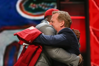 CHICAGO, IL - APRIL 30:  D.J. Humphries of the Florida Gators hugs NFL Commissioner Roger Goodell after being picked #24 overall by the Arizona Cardinals during the first round of the 2015 NFL Draft at the Auditorium Theatre of Roosevelt University on Apr