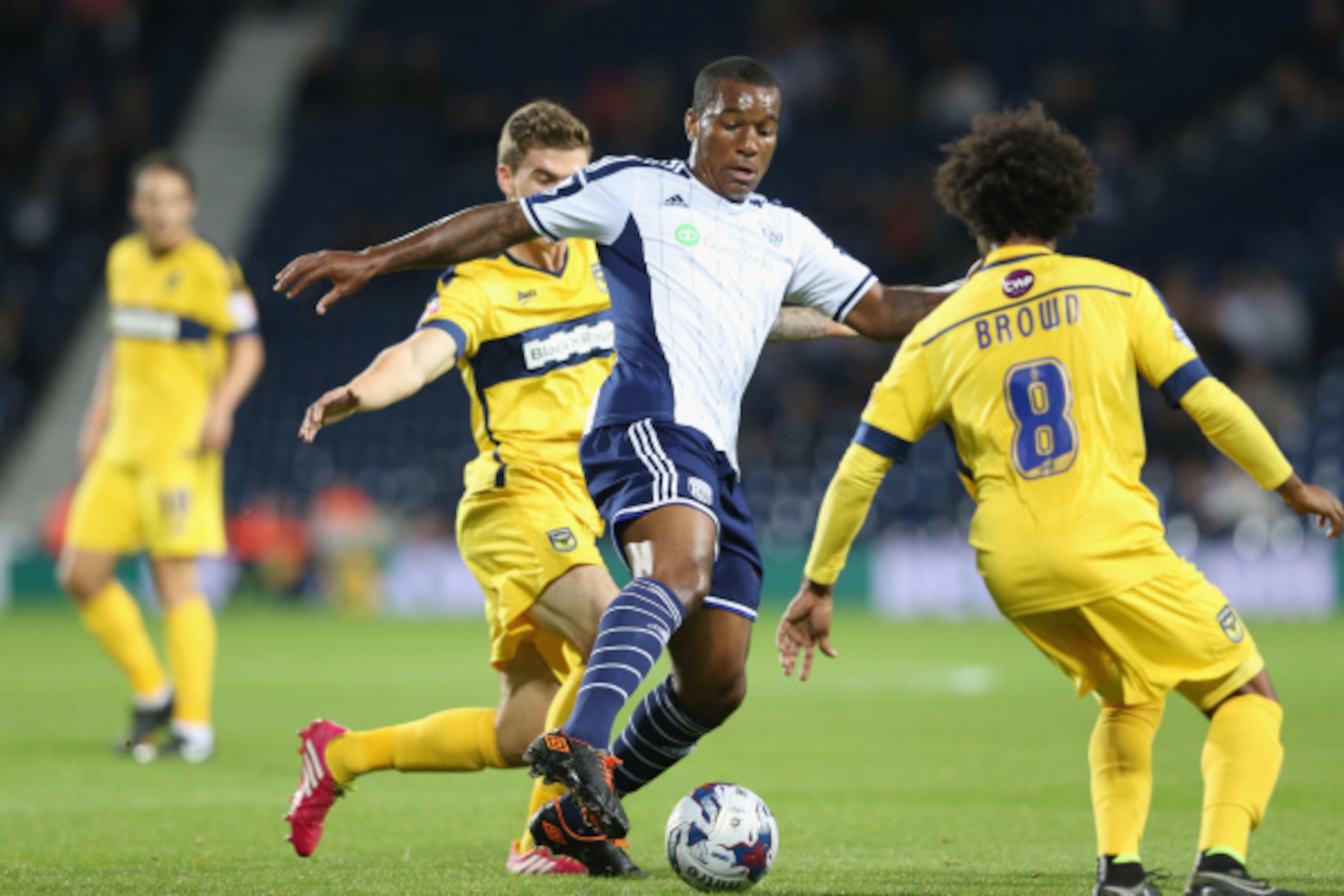 WEST BROMWICH, ENGLAND - AUGUST 26:  Andre Wisdom of West Bromwich runs with the ball during the Capital One Cup second round match between West Bromwich Albion and Oxford United at The Hawthorns on August 26, 2014 in West Bromwich, England.  (Photo by Da