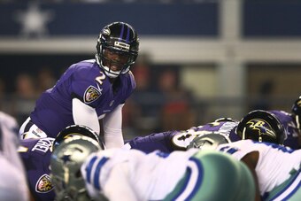 ARLINGTON, TX - AUGUST 16:  Tyrod Taylor #2 of the Baltimore Ravens stands under center against the Dallas Cowboys in the second half of the preseason game at AT&T Stadium on August 16, 2014 in Arlington, Texas.  (Photo by Ronald Martinez/Getty Images)