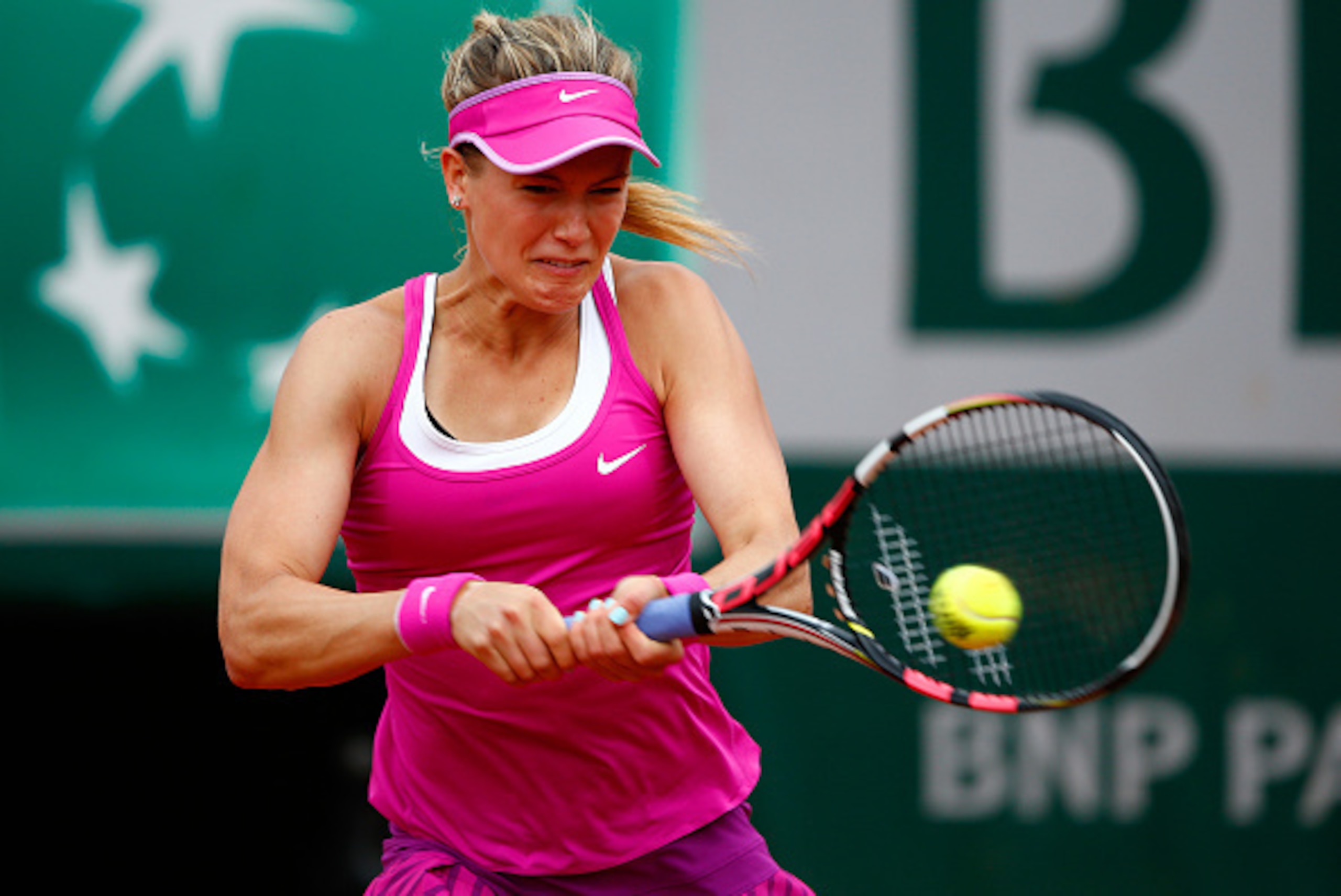 PARIS, FRANCE - MAY 26:  Eugenie Bouchard of Canada returns a shot during her women's singles match against Kristina Mladenovic of France on day three of the 2015 French Open at Roland Garros on May 26, 2015 in Paris, France.  (Photo by Julian Finney/Gett